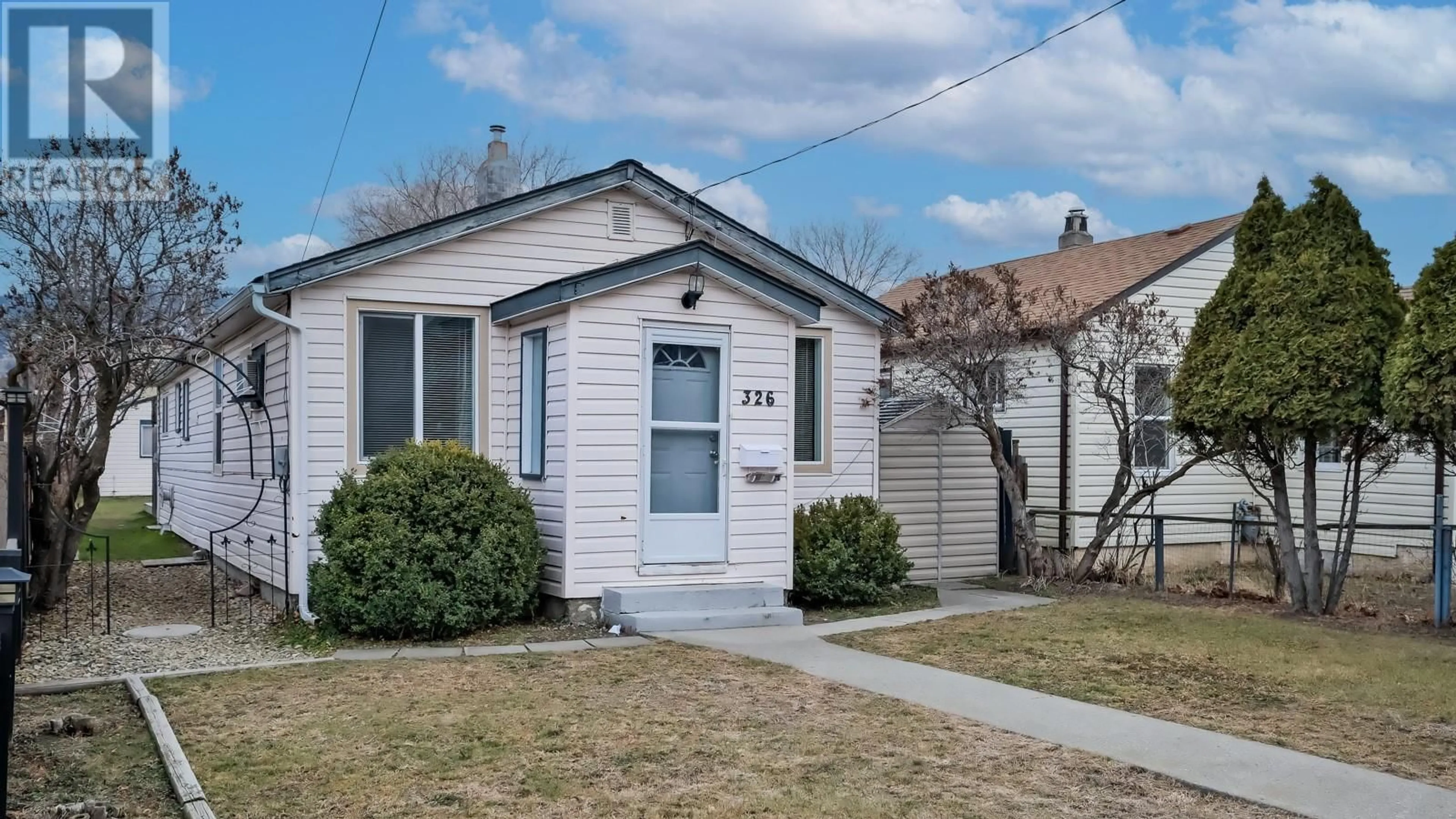 Home with vinyl exterior material, street for 326 RIGSBY STREET, Penticton British Columbia V2A5S7