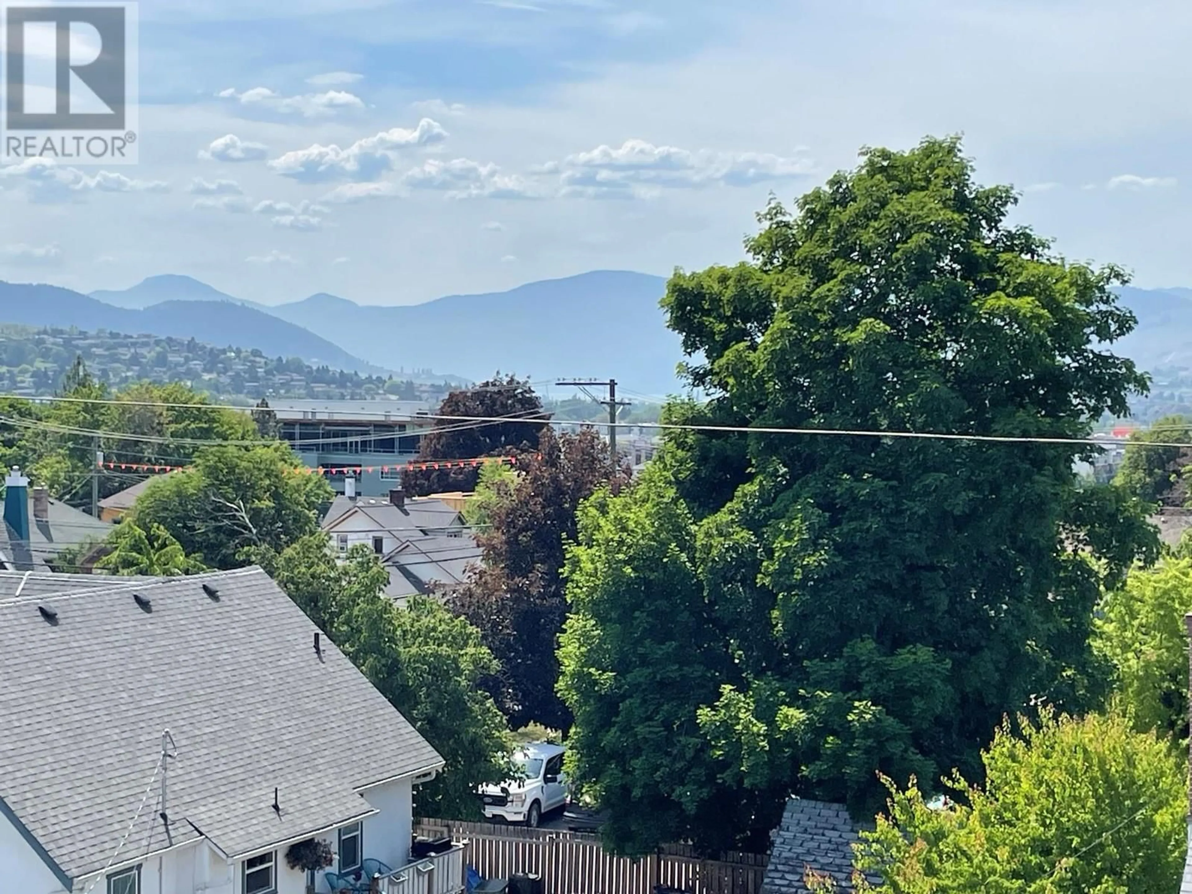 A pic from outside/outdoor area/front of a property/back of a property/a pic from drone, water/lake/river/ocean view for B - 3203 25 STREET, Vernon British Columbia V1T4R4