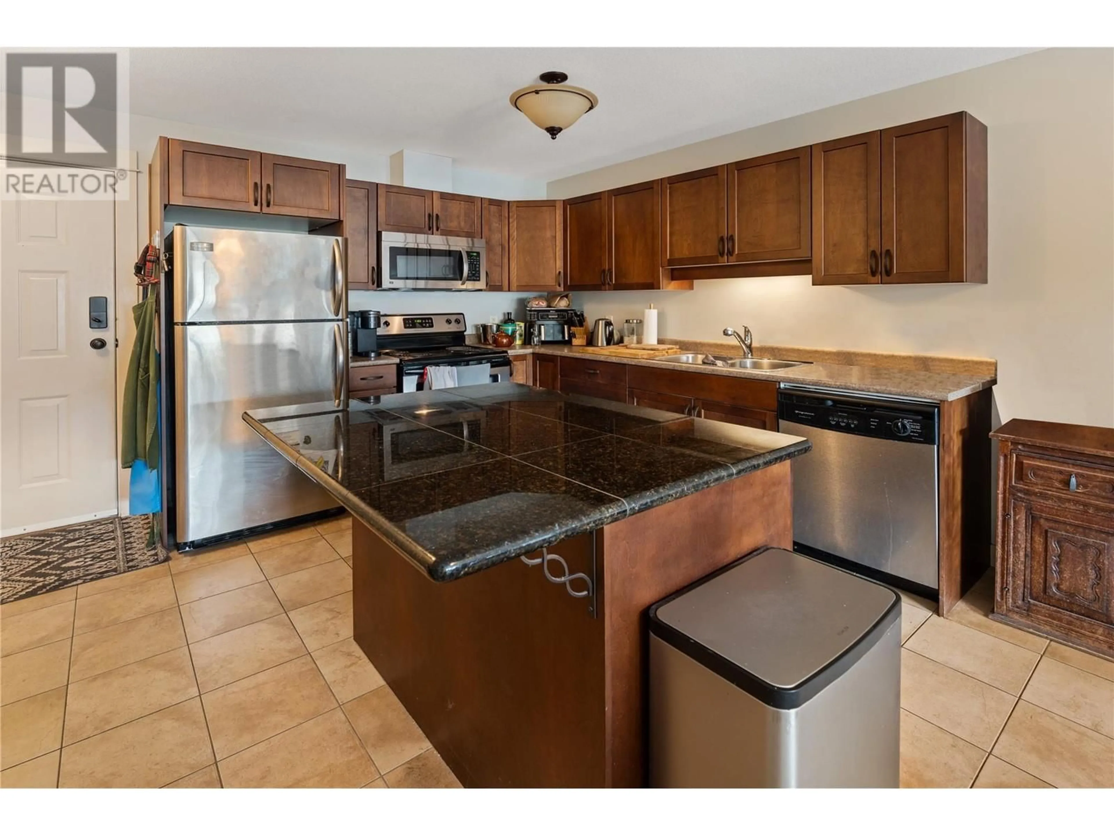 Standard kitchen, ceramic/tile floor for 406 - 3350 WOODSDALE ROAD, Lake Country British Columbia V4V2R7