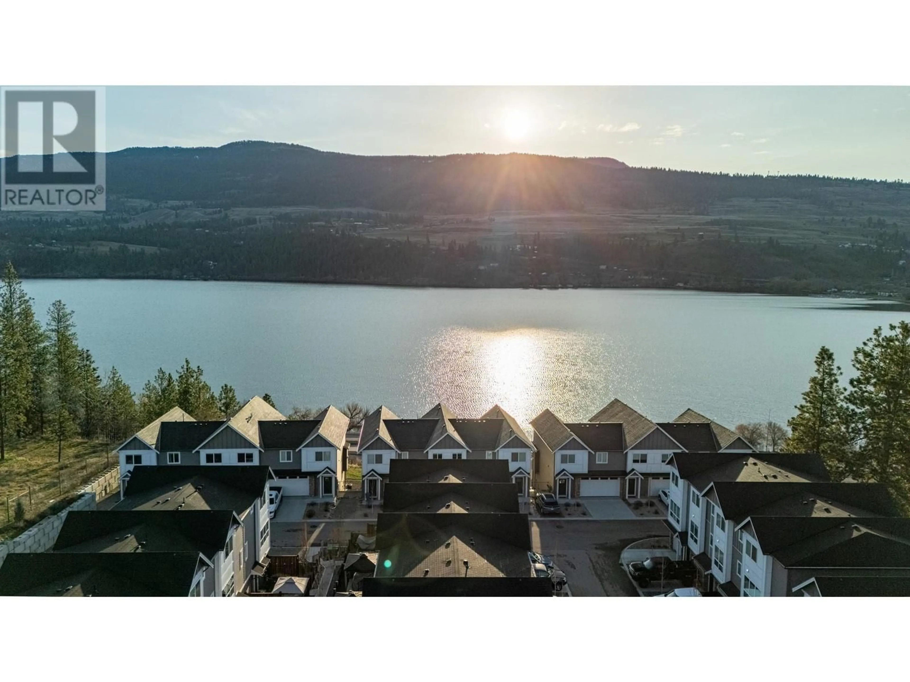A pic from outside/outdoor area/front of a property/back of a property/a pic from drone, water/lake/river/ocean view for 22 - 12075 OCEOLA ROAD, Lake Country British Columbia V4V1H1