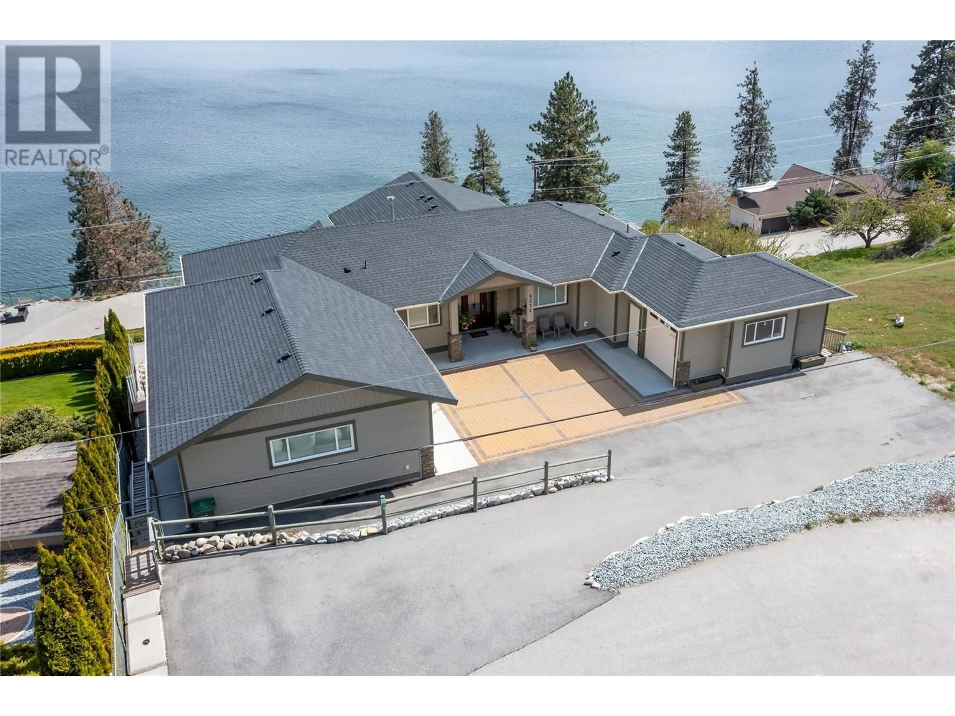 A pic from outside/outdoor area/front of a property/back of a property/a pic from drone, water/lake/river/ocean view for 6372 TOPHAM PLACE, Peachland British Columbia V0H1X7