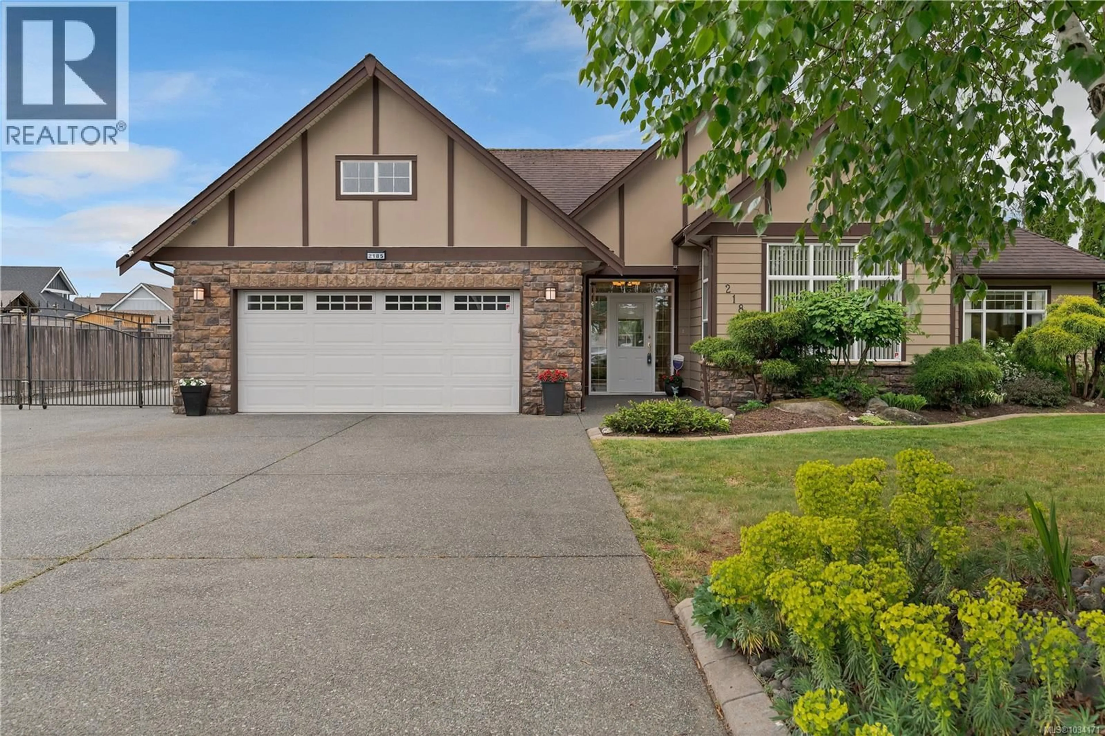 Home with brick exterior material, street for 2185 FOREST GROVE DRIVE, Campbell River British Columbia V9W6H9