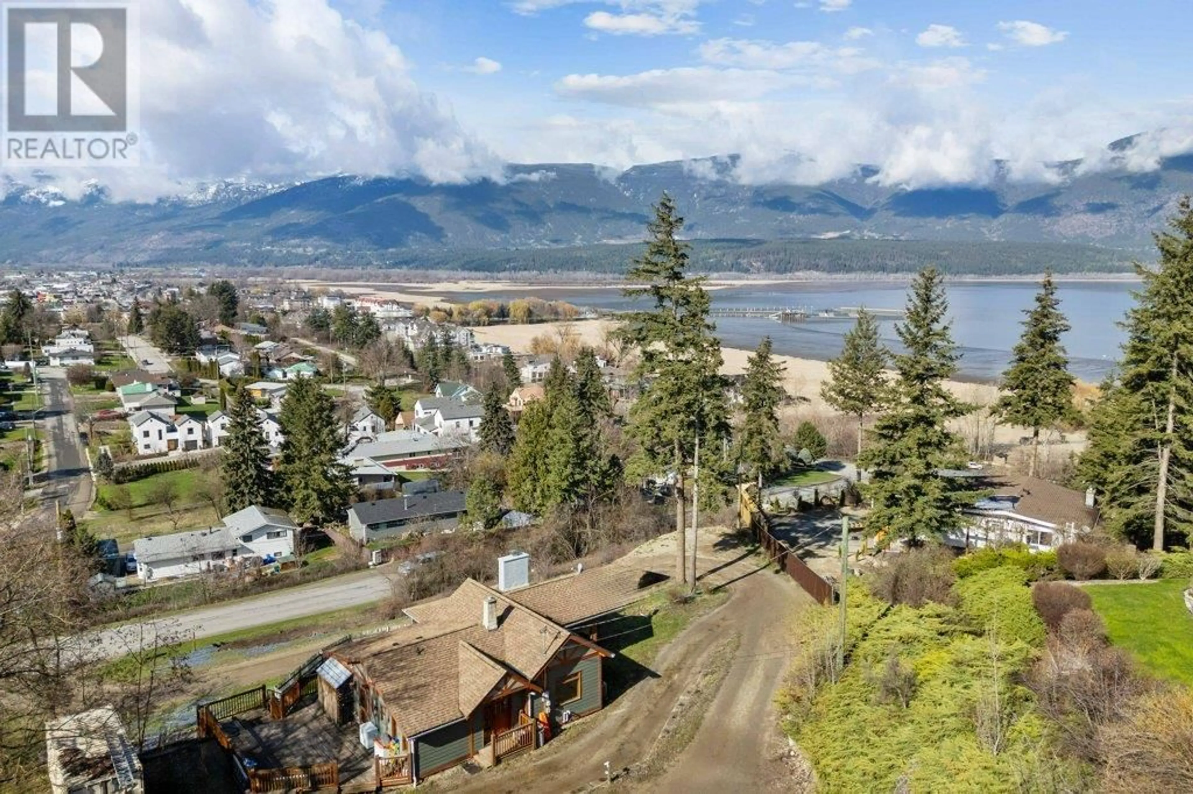 A pic from outside/outdoor area/front of a property/back of a property/a pic from drone, mountain view for 1321 10 AVENUE NORTHEAST, Salmon Arm British Columbia V1E2V6