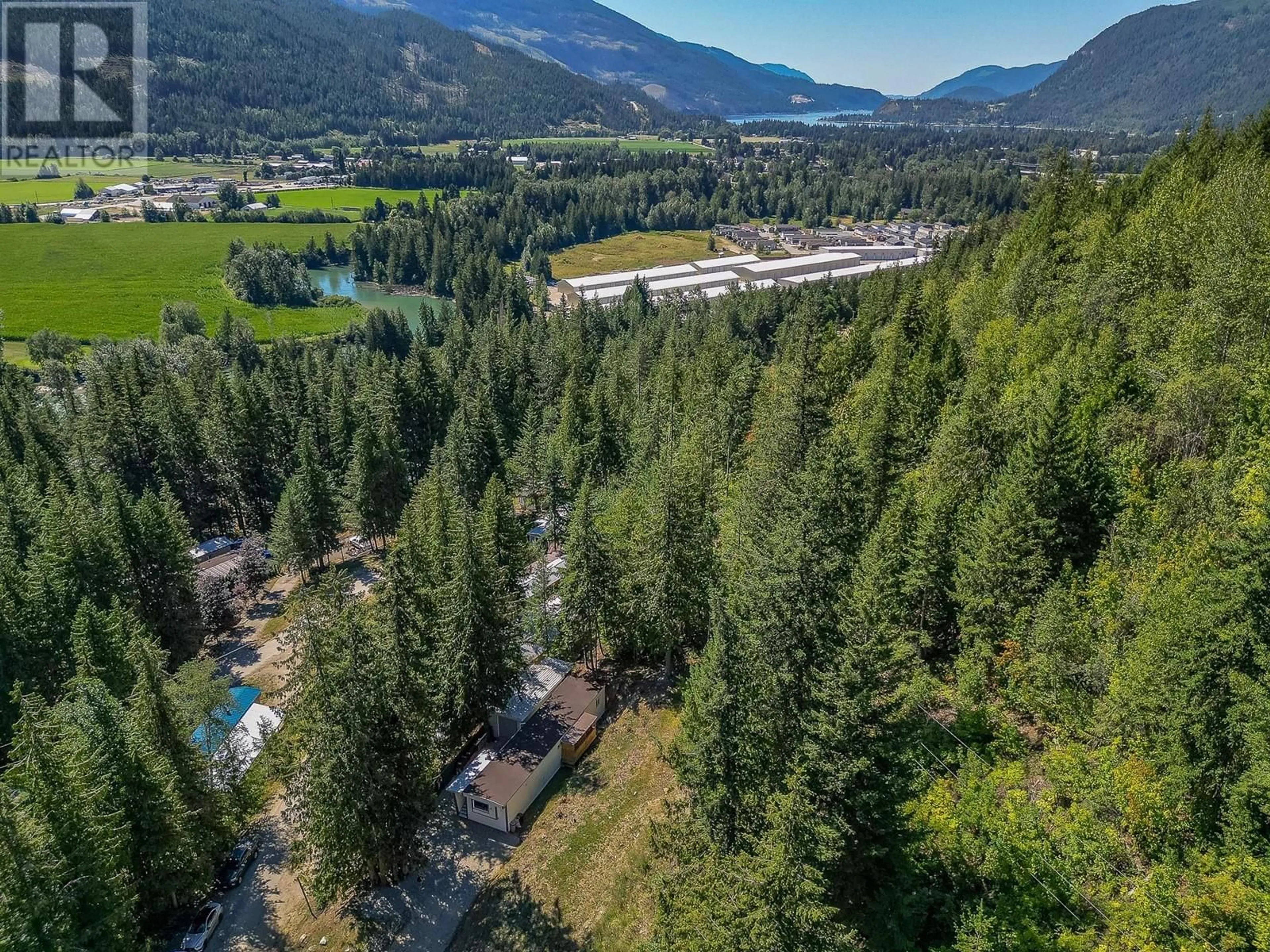 A pic from outside/outdoor area/front of a property/back of a property/a pic from drone, mountain view for 9 - 2036 SOLSQUA-SICAMOUS ROAD, Sicamous British Columbia V0E2V4