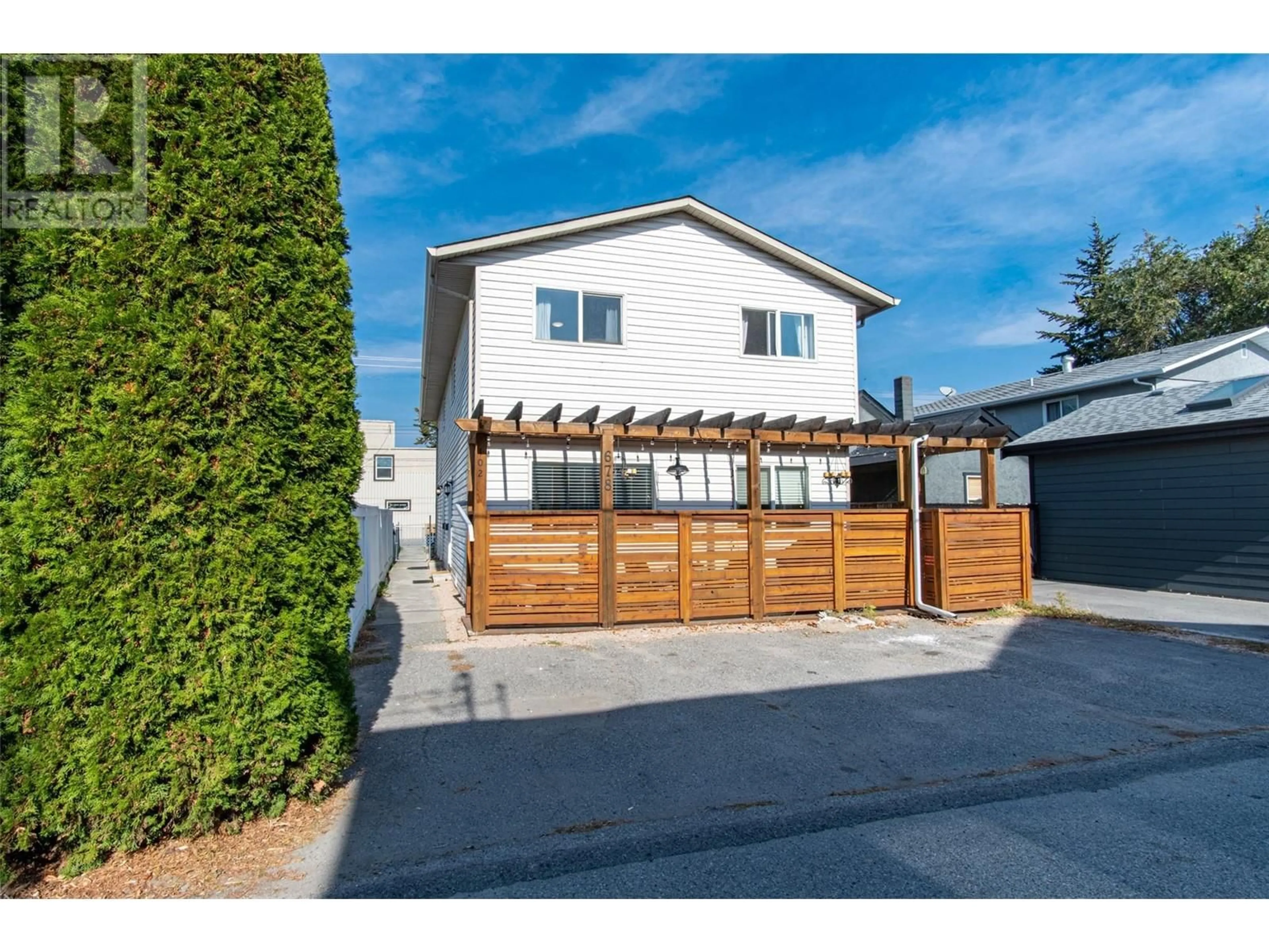 A pic from outside/outdoor area/front of a property/back of a property/a pic from drone, street for 102 - 678 WADE AVENUE, Penticton British Columbia V2A6X7