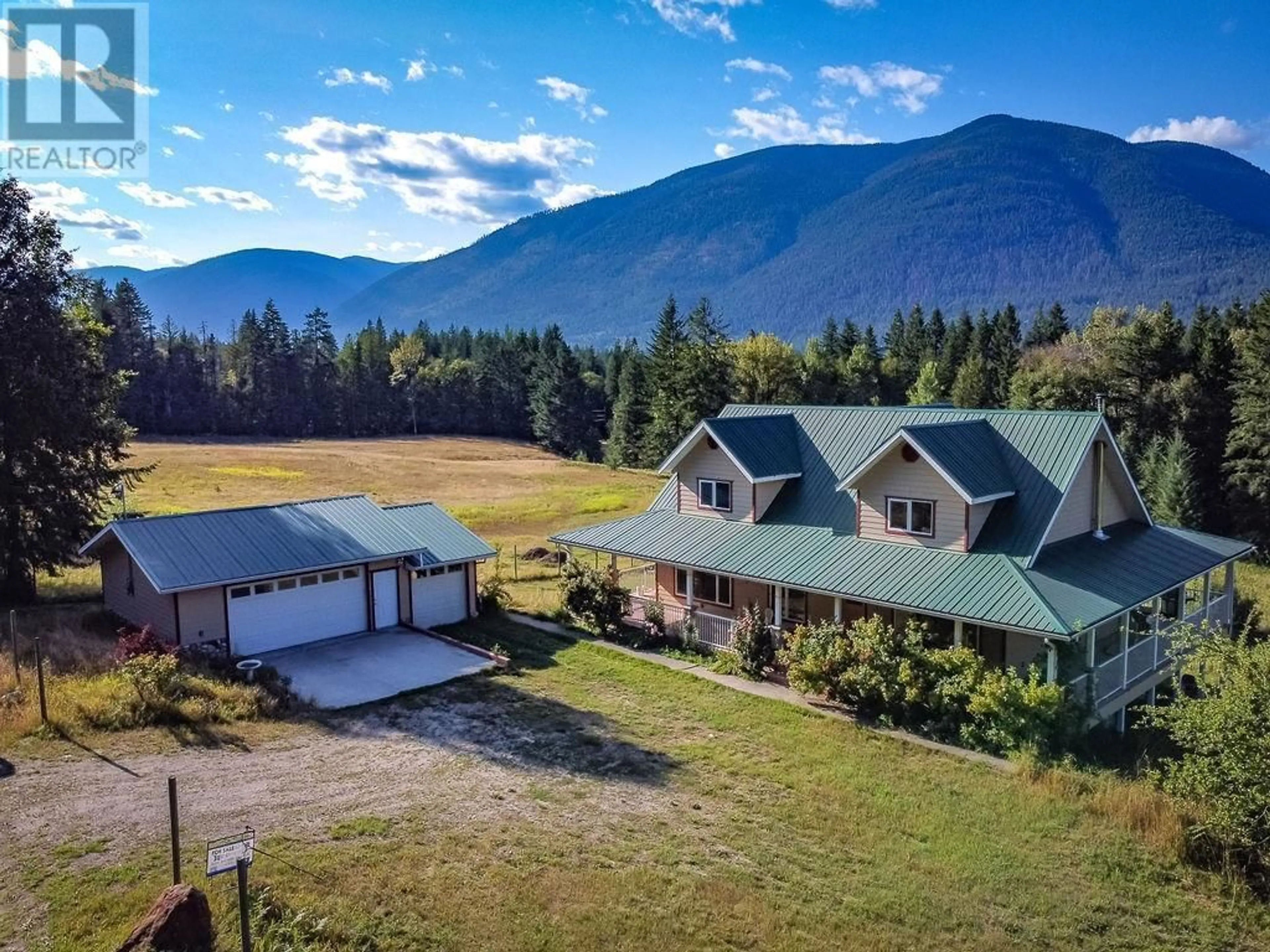 A pic from outside/outdoor area/front of a property/back of a property/a pic from drone, mountain view for 6291 MILL CREEK ROAD, Harrop British Columbia V1L6P9