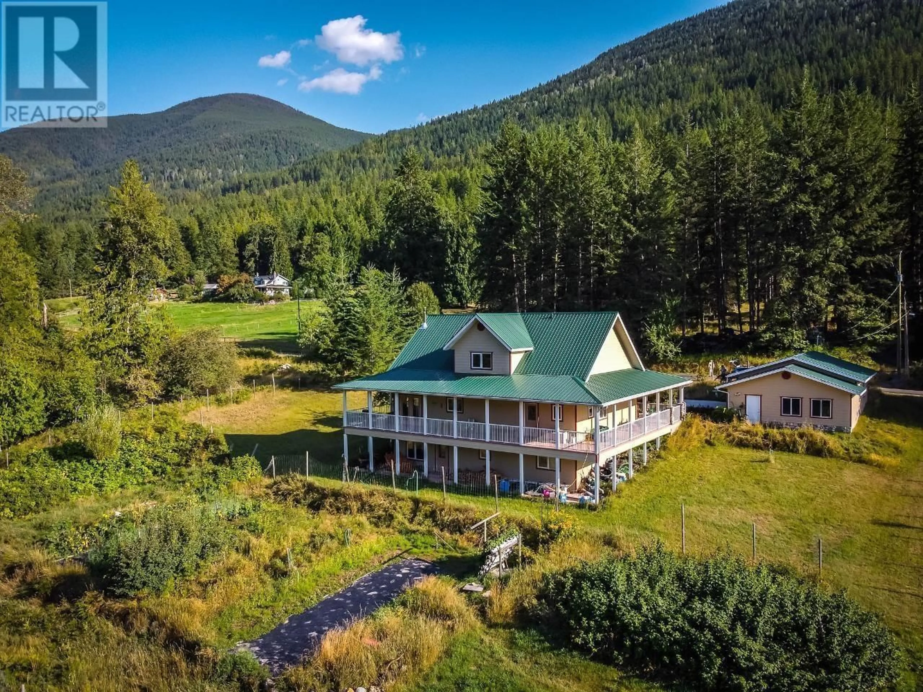 A pic from outside/outdoor area/front of a property/back of a property/a pic from drone, mountain view for 6291 MILL CREEK ROAD, Harrop British Columbia V1L6P9