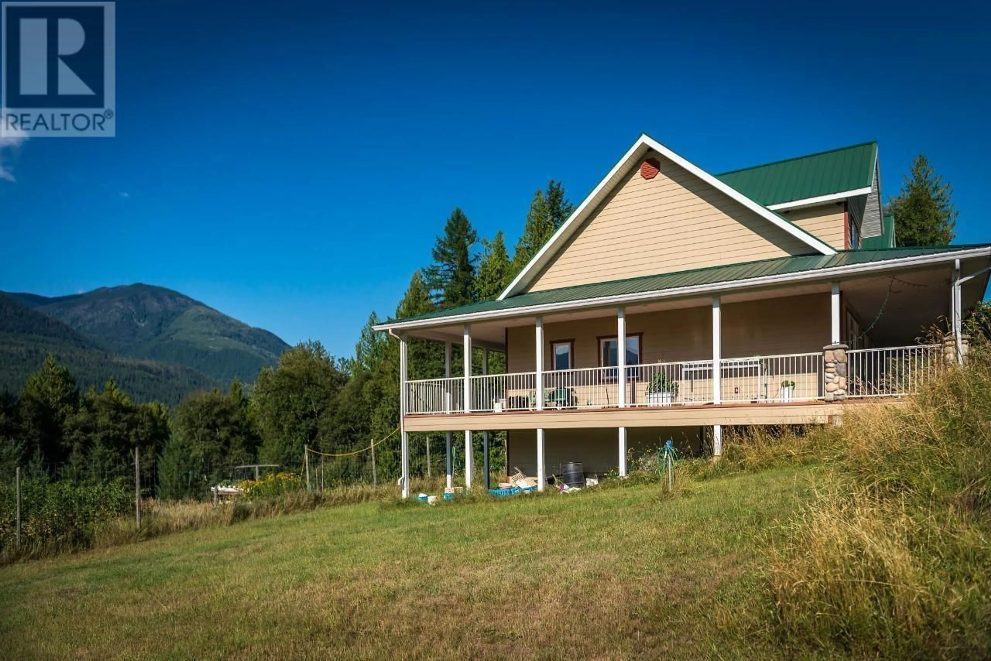 A pic from outside/outdoor area/front of a property/back of a property/a pic from drone, mountain view for 6291 MILL CREEK ROAD, Harrop British Columbia V1L6P9