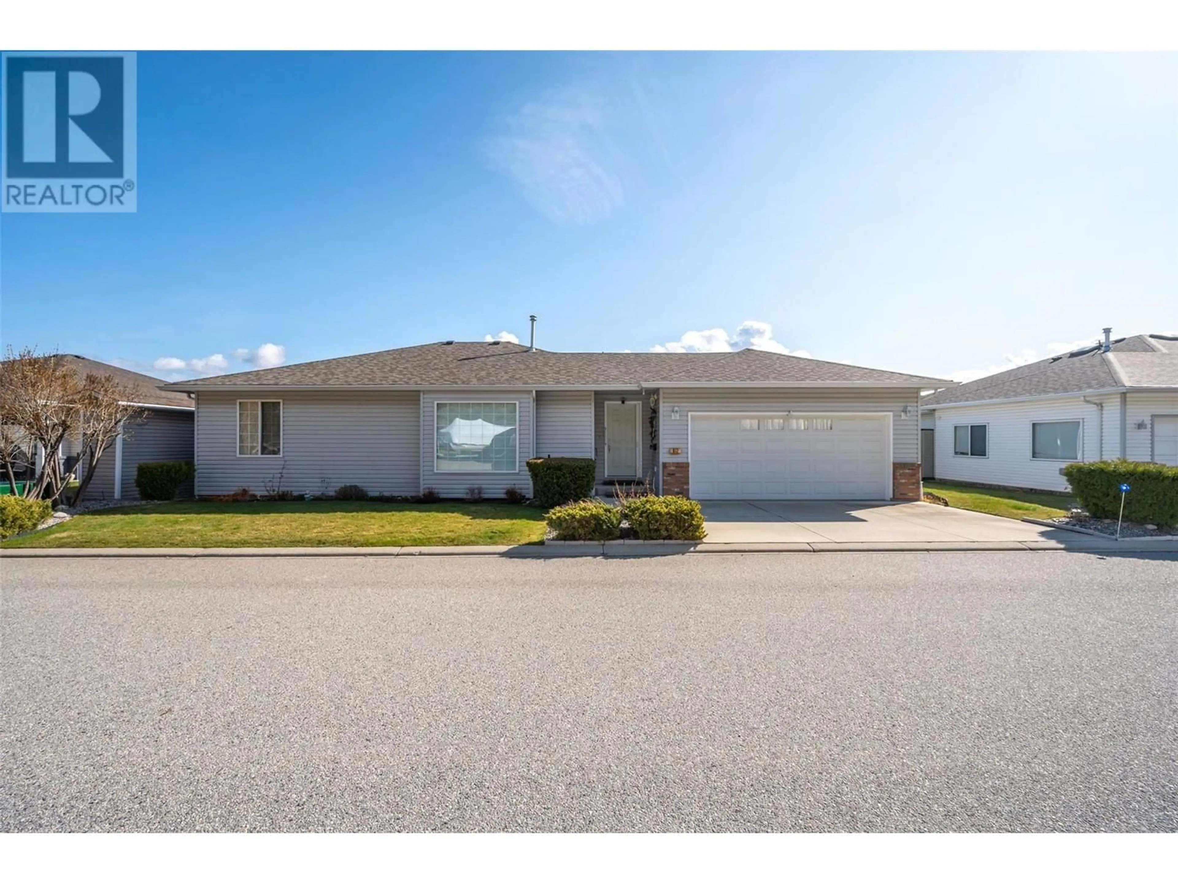 Home with vinyl exterior material, street for 612 RED WING DRIVE, Penticton British Columbia V2A8N7
