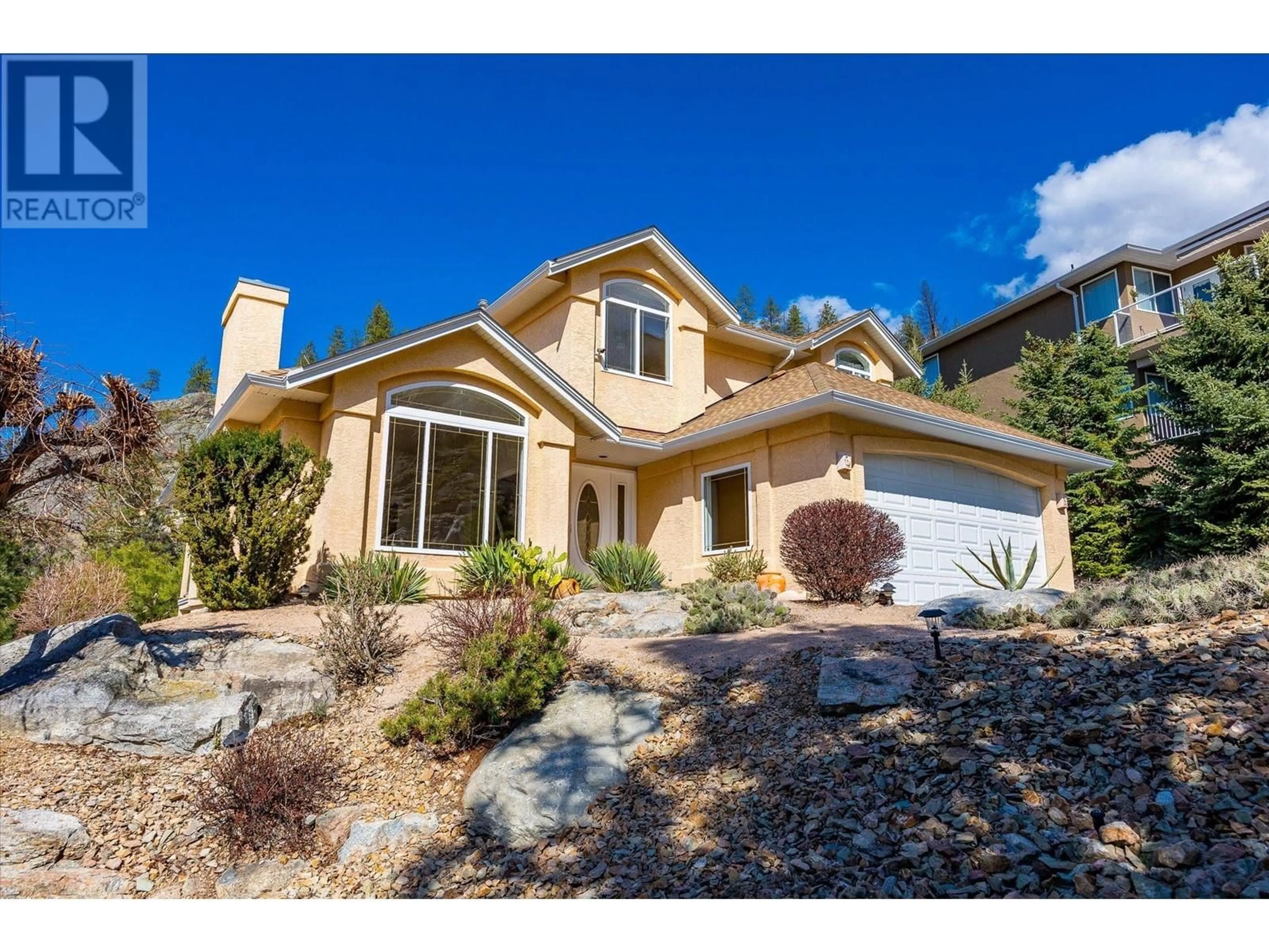Home with vinyl exterior material, street for 161 CHRISTIE MOUNTAIN LANE, Okanagan Falls British Columbia V0H1R0