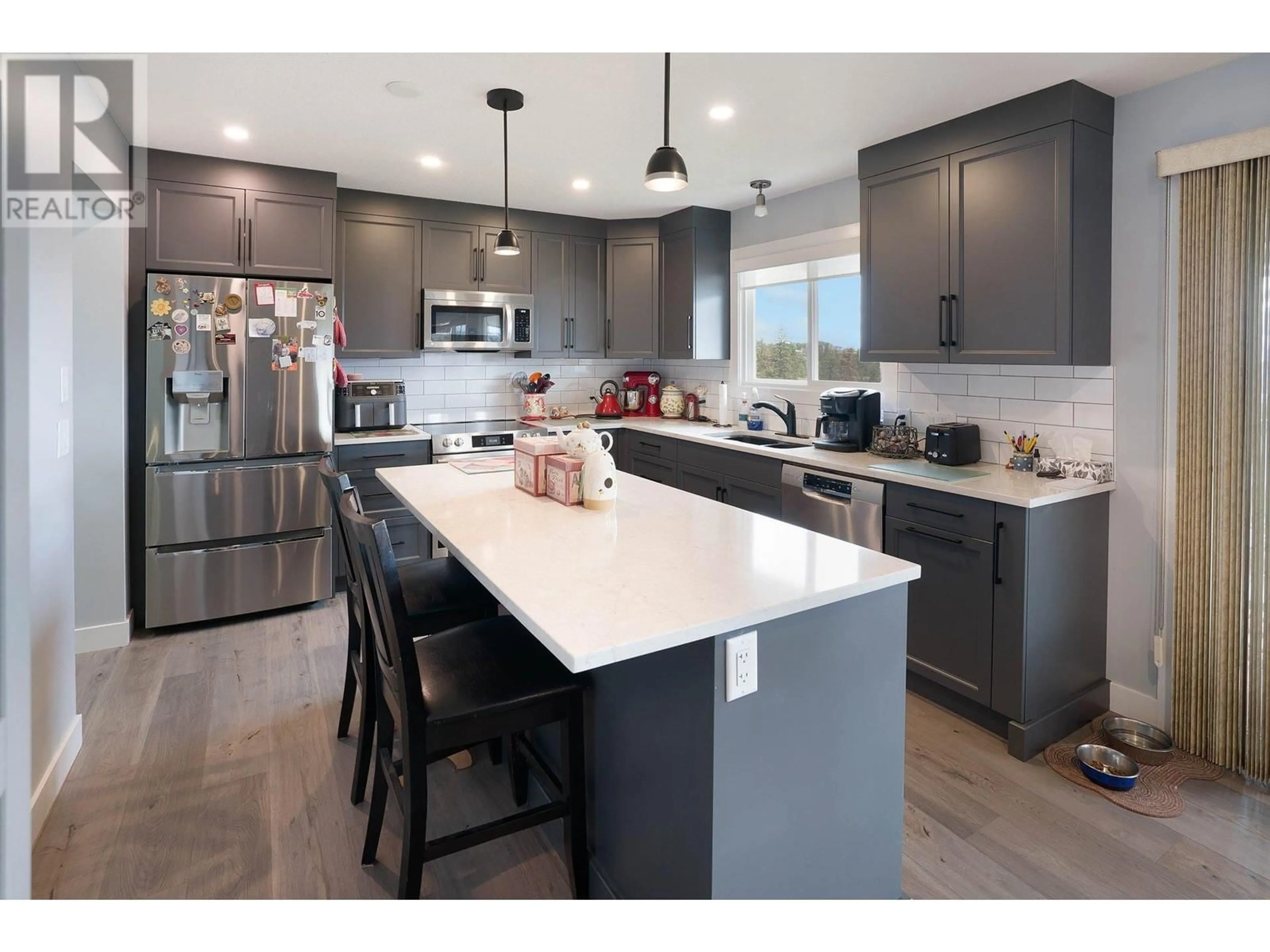 Open concept kitchen, ceramic/tile floor for 3767 GLENWAY ROAD, West Kelowna British Columbia V4T1E3