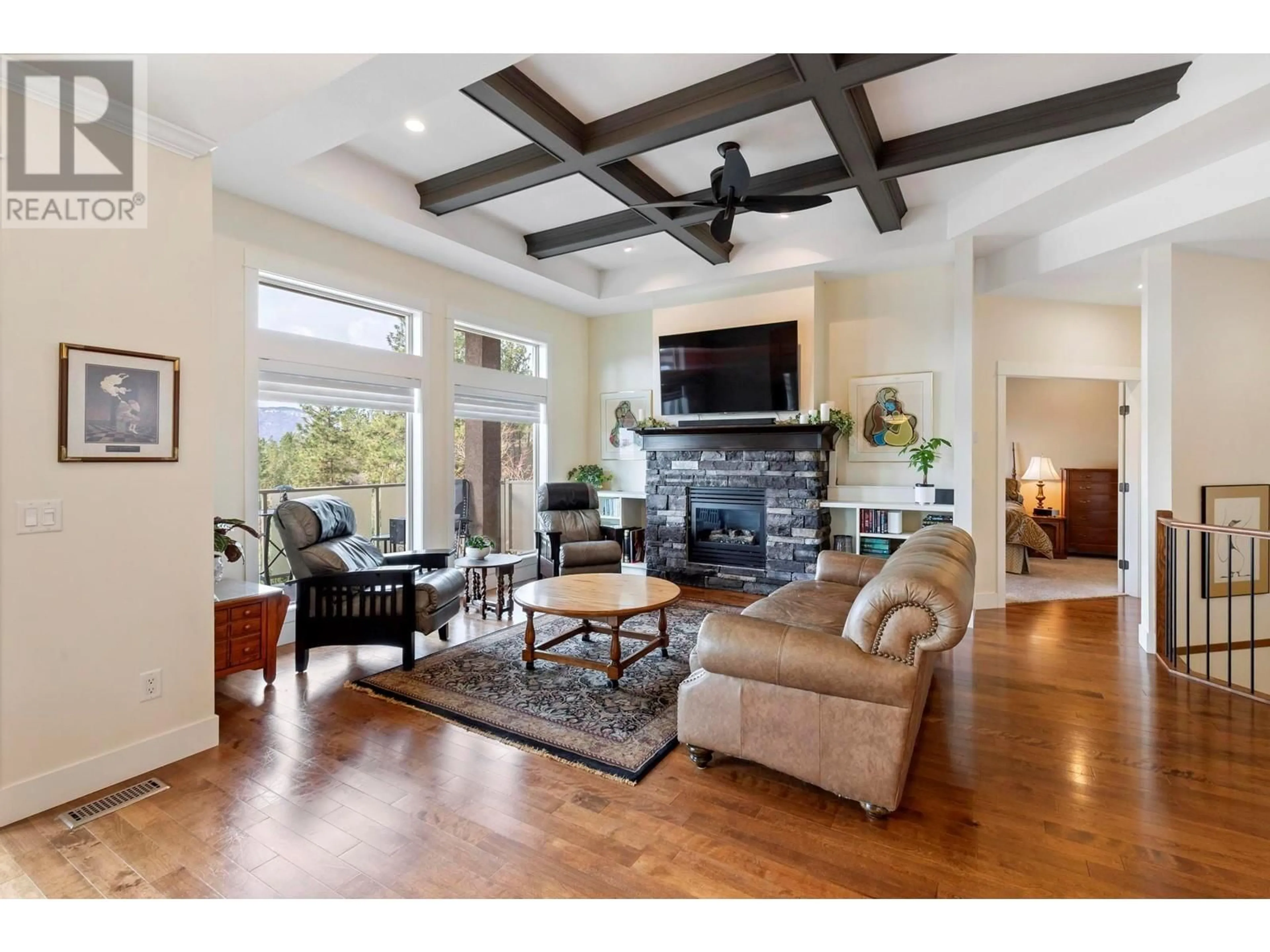 Living room with furniture, wood/laminate floor for 12862 APEX DRIVE, Lake Country British Columbia V4V2N9