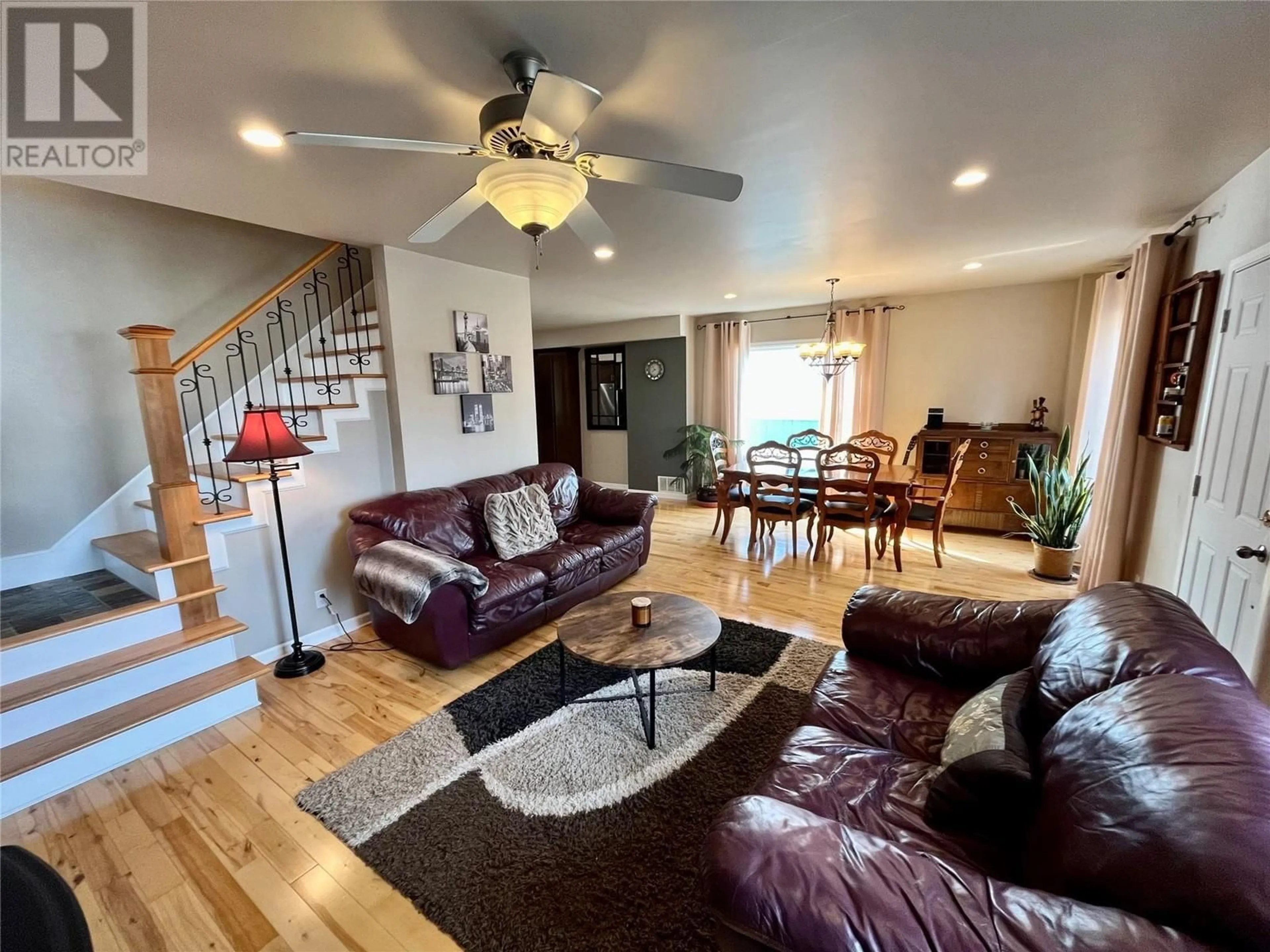 Living room with furniture, wood/laminate floor for 113 NELSON AVENUE NORTH, Nakusp British Columbia V0G1R0