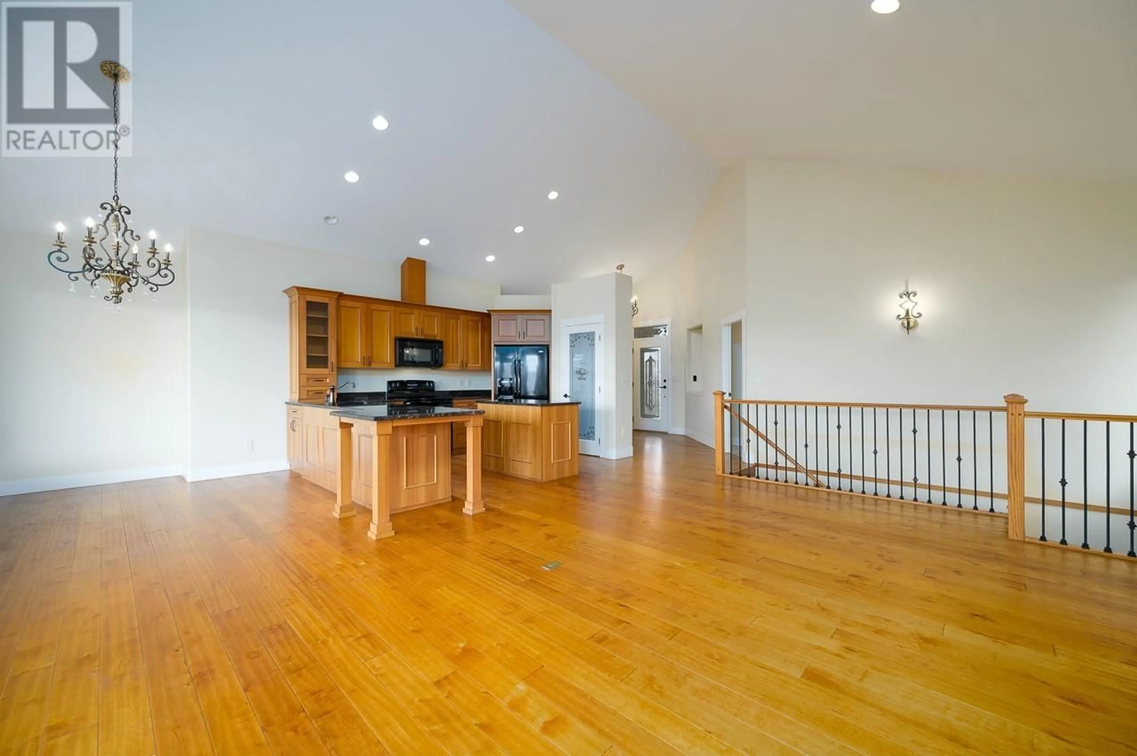 Open concept kitchen, wood/laminate floor for 1067 QUAIL DRIVE, Kamloops British Columbia V2B8N9