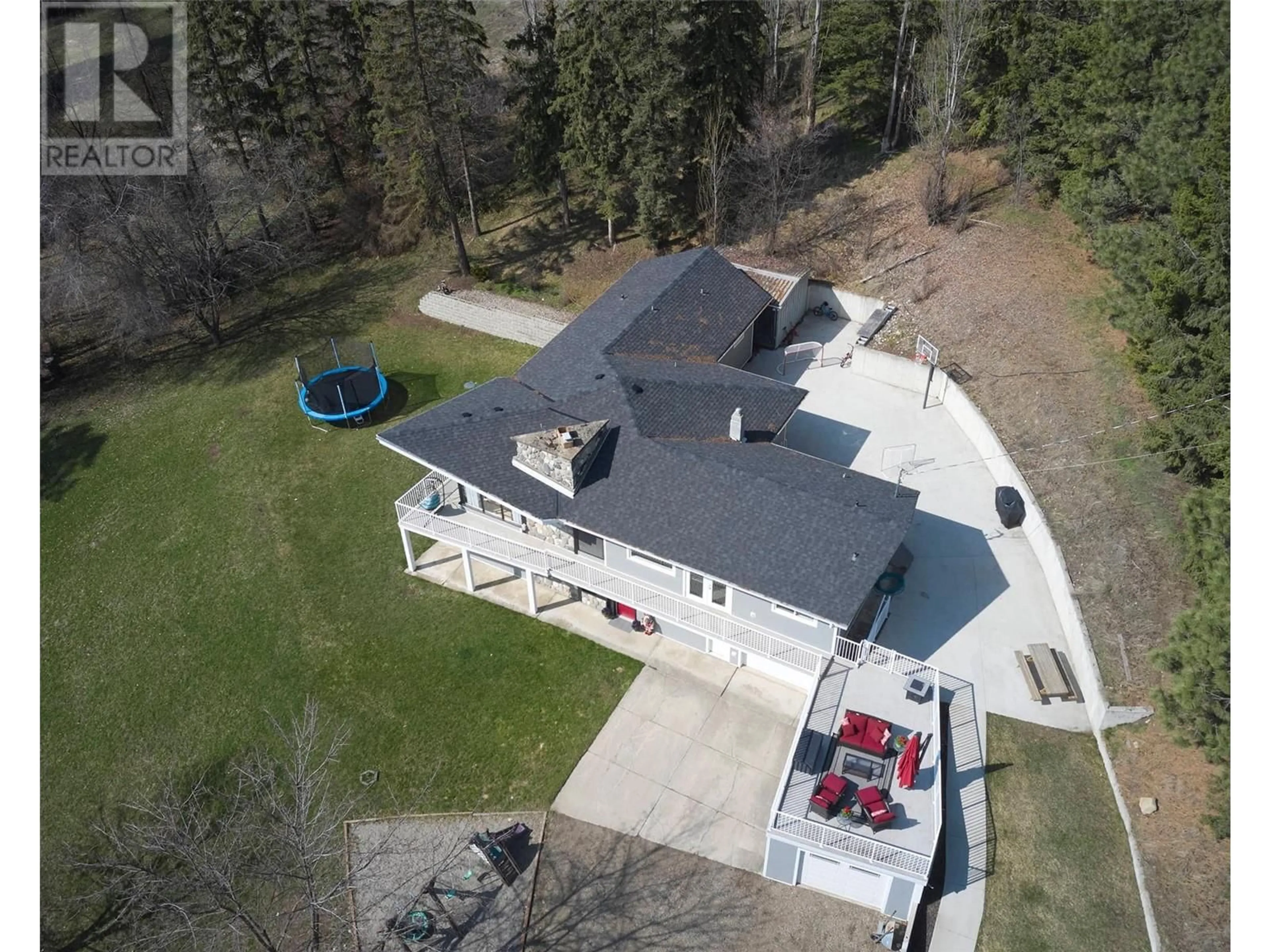 A pic from outside/outdoor area/front of a property/back of a property/a pic from drone, unknown for 5719 6 HIGHWAY, Coldstream British Columbia V1B3E1