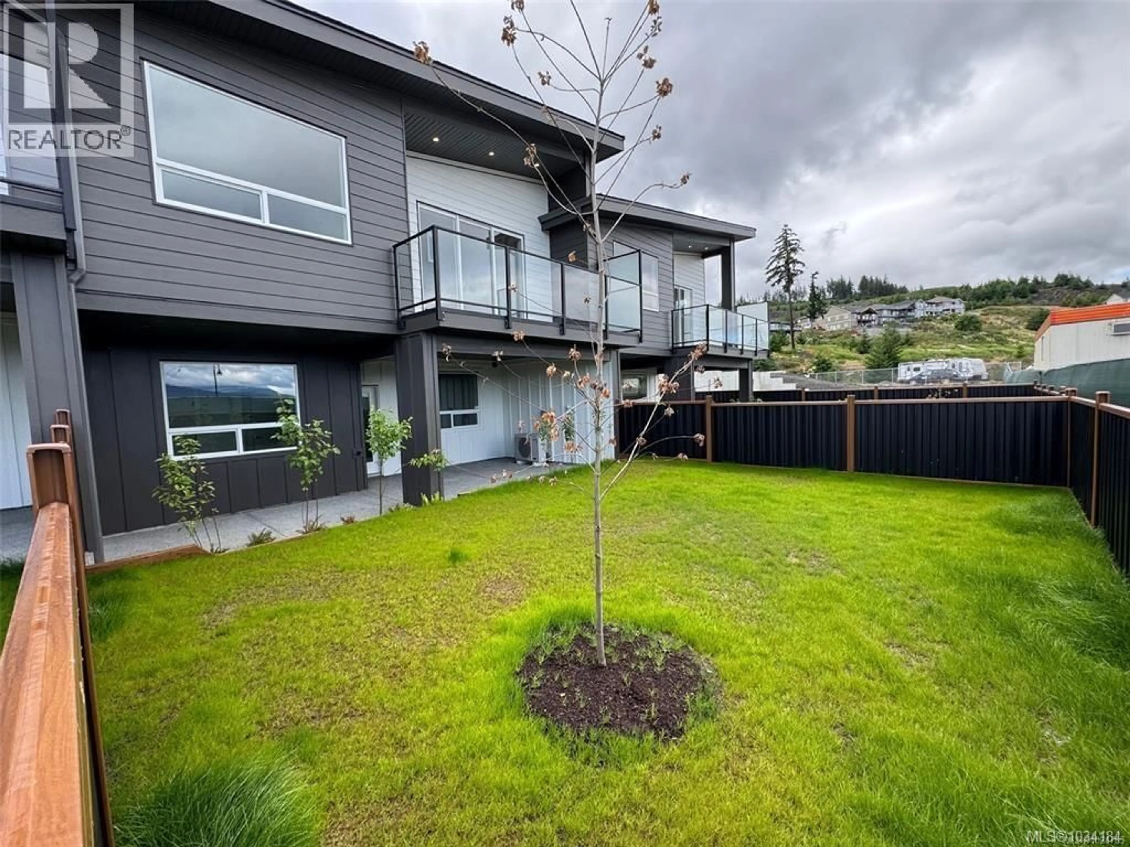 A pic from outside/outdoor area/front of a property/back of a property/a pic from drone, mountain view for 113 - 3116 WOODRUSH DRIVE, Duncan British Columbia V9L0G1
