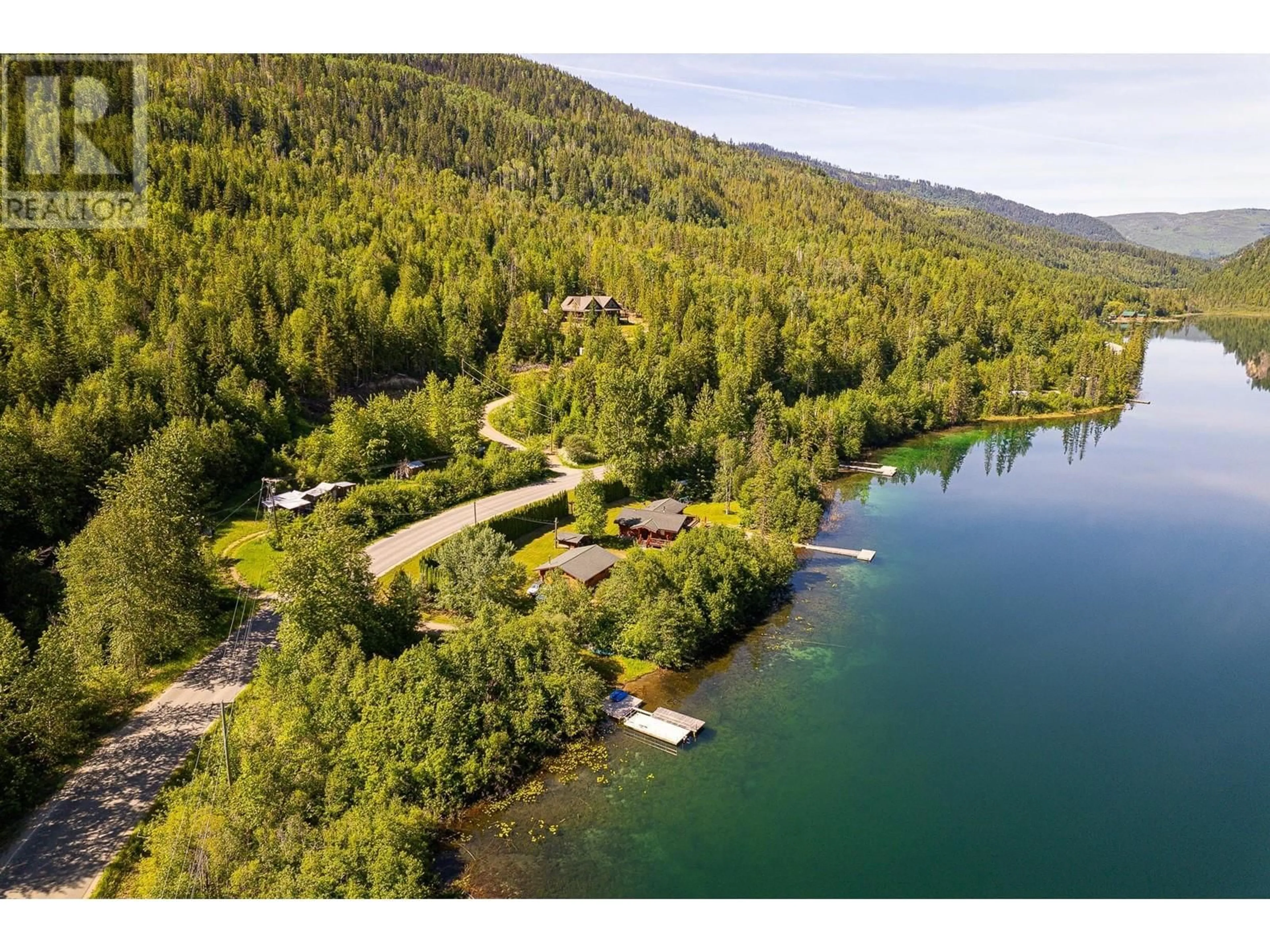 A pic from outside/outdoor area/front of a property/back of a property/a pic from drone, water/lake/river/ocean view for 1860 AGATE BAY ROAD, Barriere British Columbia V0E2E0
