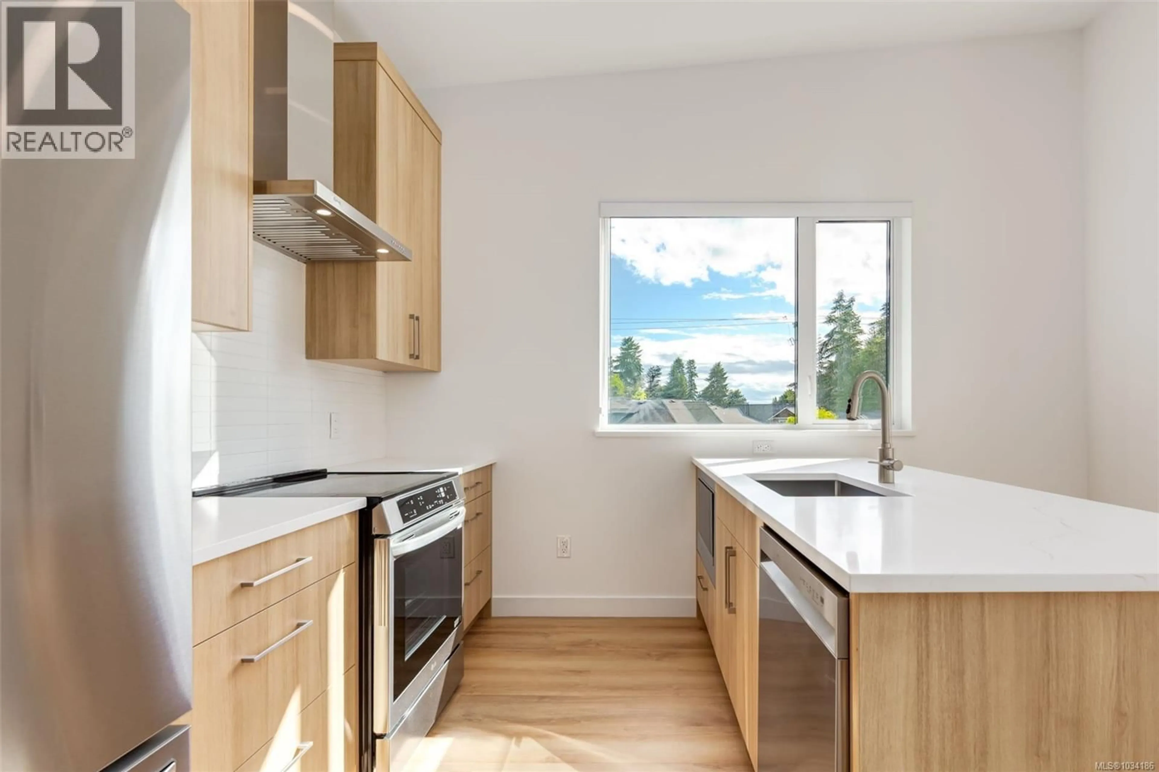 Standard kitchen, wood/laminate floor for 201 - 7181 LANTZVILLE ROAD, Lantzville British Columbia V0R2H0