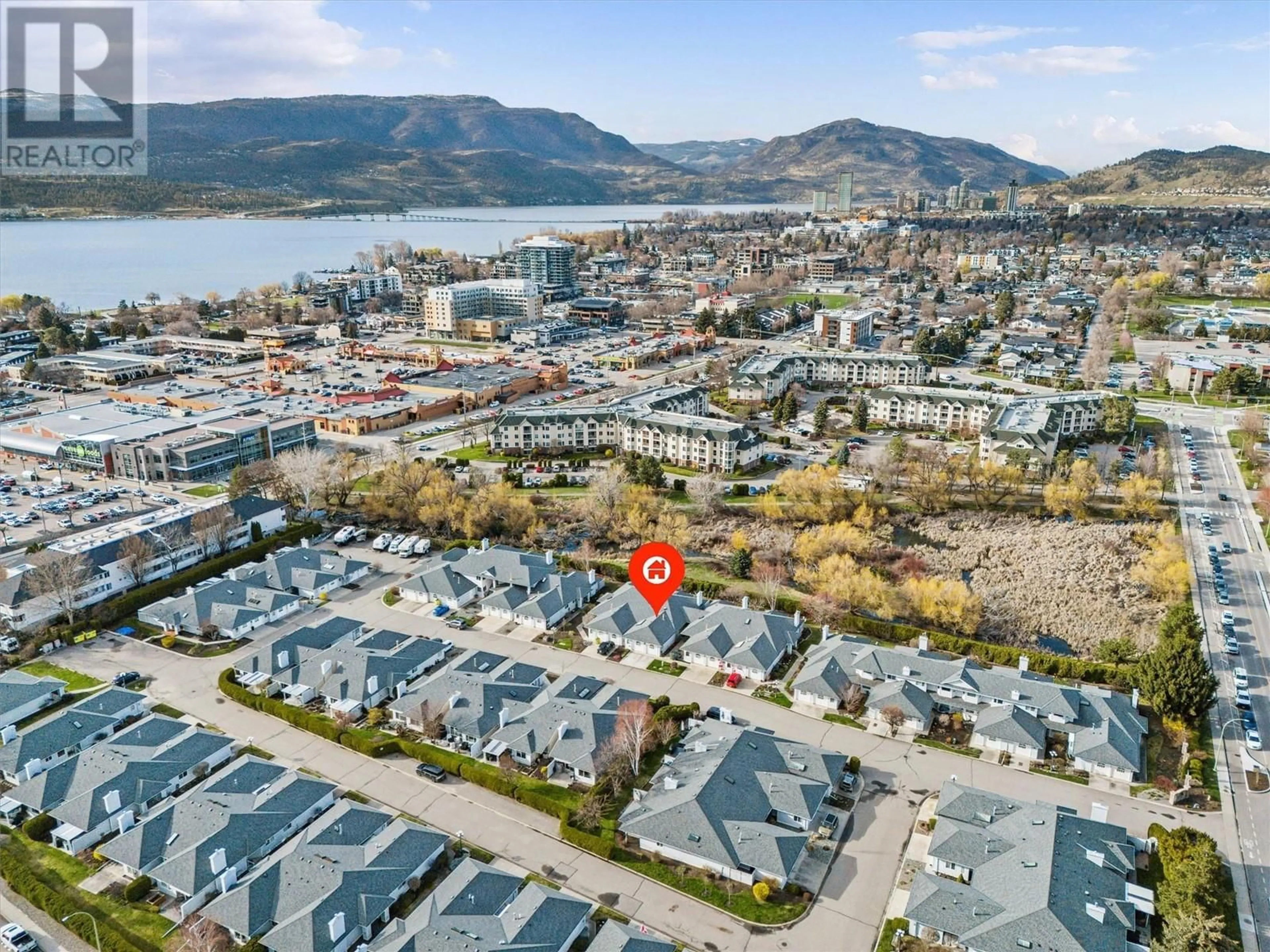 A pic from outside/outdoor area/front of a property/back of a property/a pic from drone, mountain view for 9 - 3370 CASORSO ROAD, Kelowna British Columbia V1W3J2
