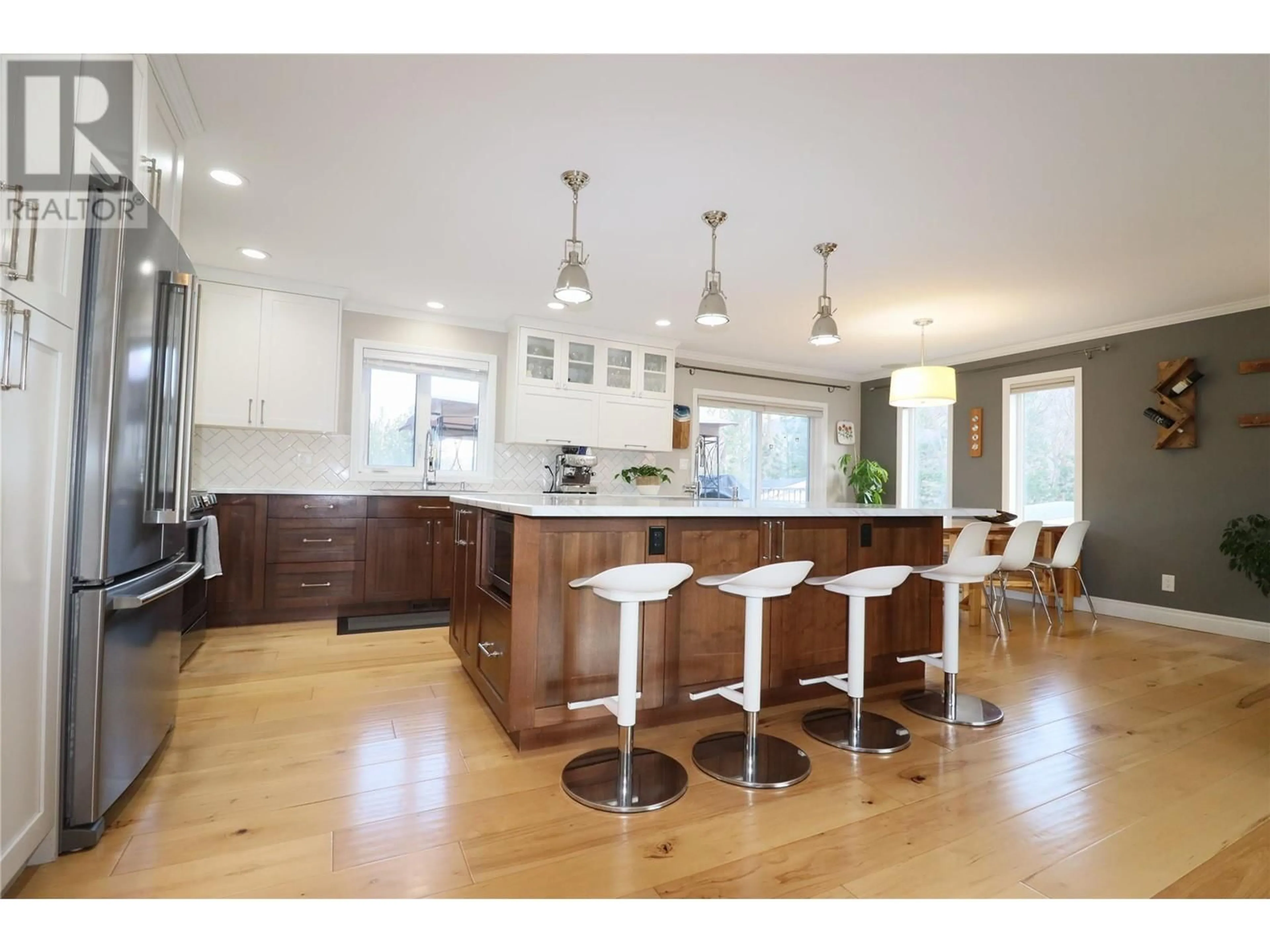 Open concept kitchen, wood/laminate floor for 2240 SELKIRK PLACE, Grand Forks British Columbia V0H1H0