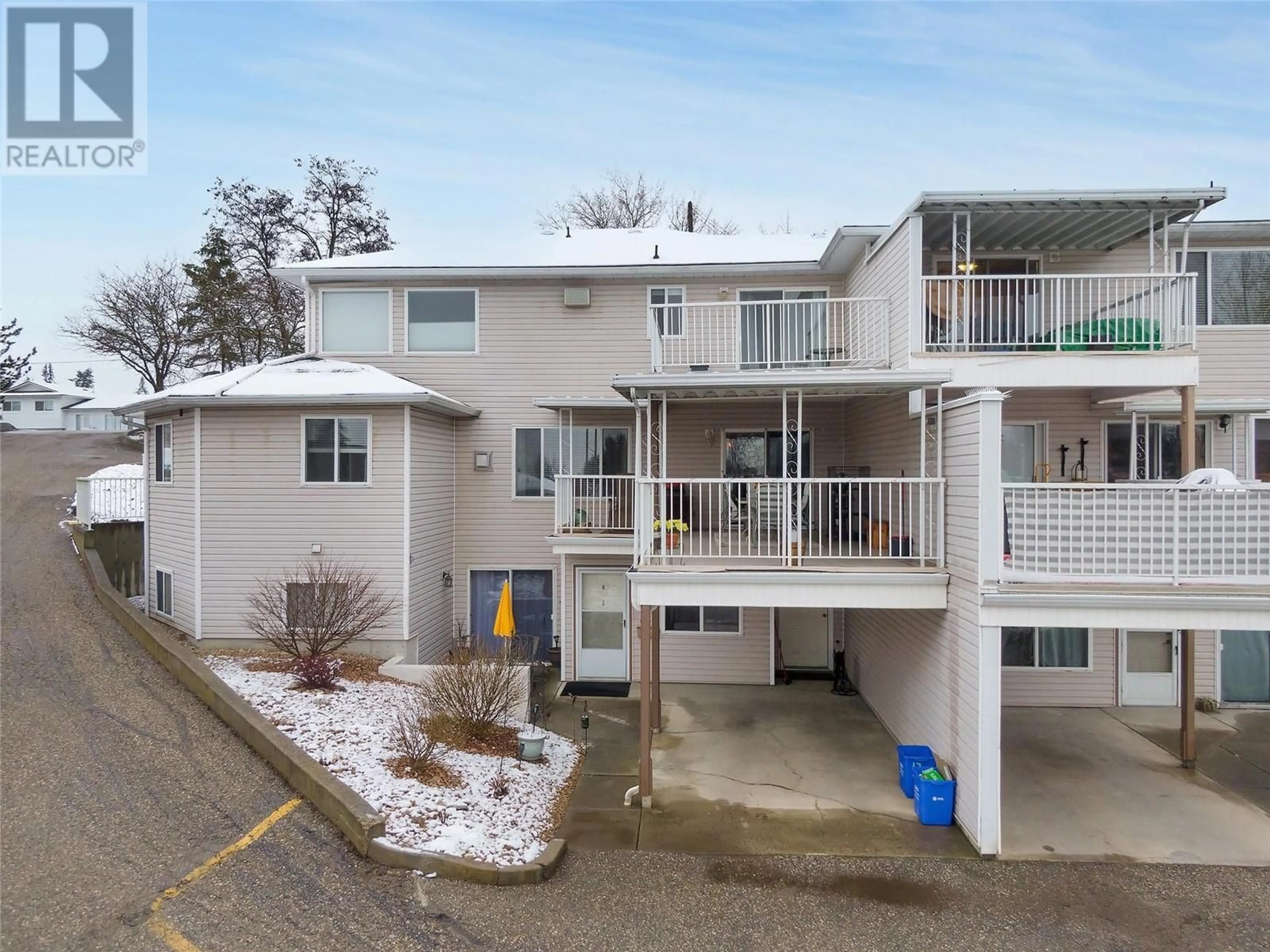 A pic from outside/outdoor area/front of a property/back of a property/a pic from drone, unknown for 13 - 4404 PLEASANT VALLEY ROAD, Vernon British Columbia V1T4M3