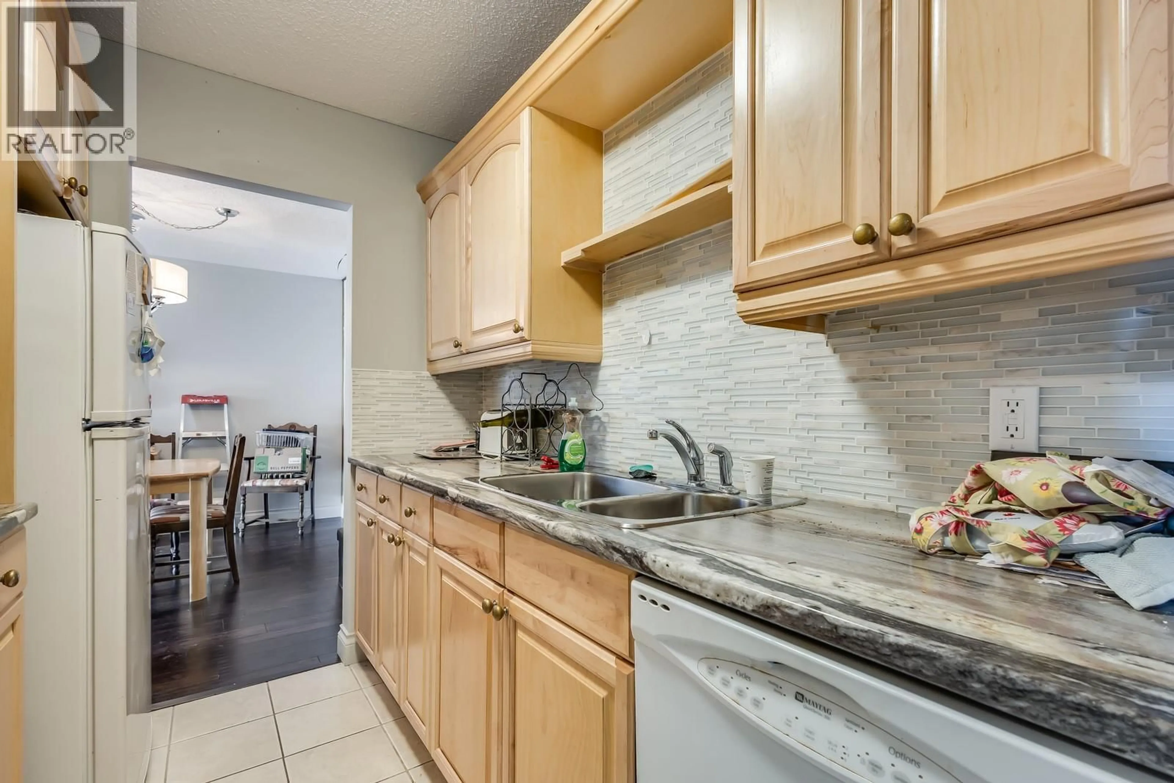 Standard kitchen, ceramic/tile floor for 204 - 1860 RICHTER STREET, Kelowna British Columbia V1Y2M9