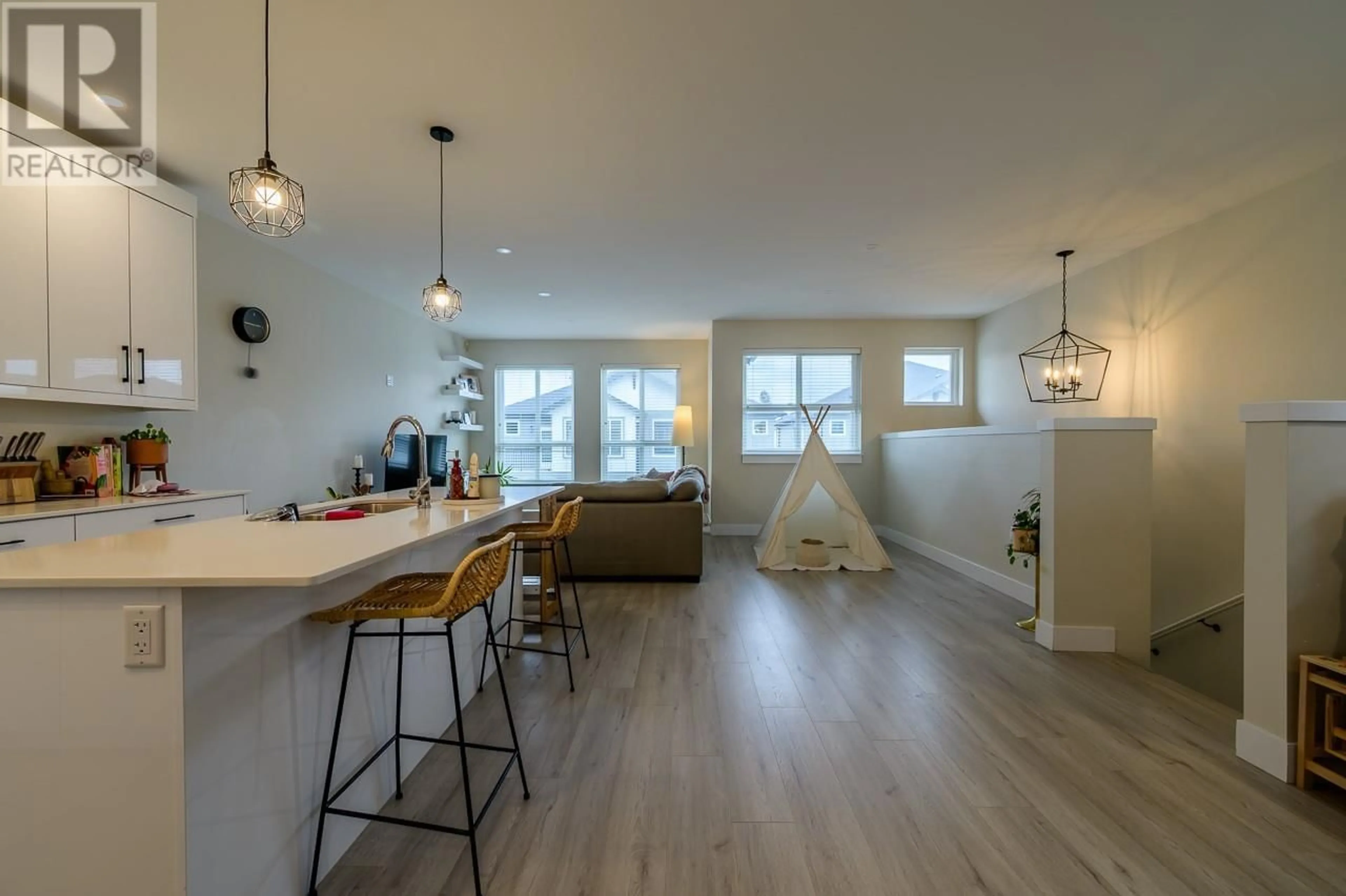 Open concept kitchen, wood/laminate floor for 105 - 2648 TRANQUILLE ROAD, Kamloops British Columbia V2B0J4