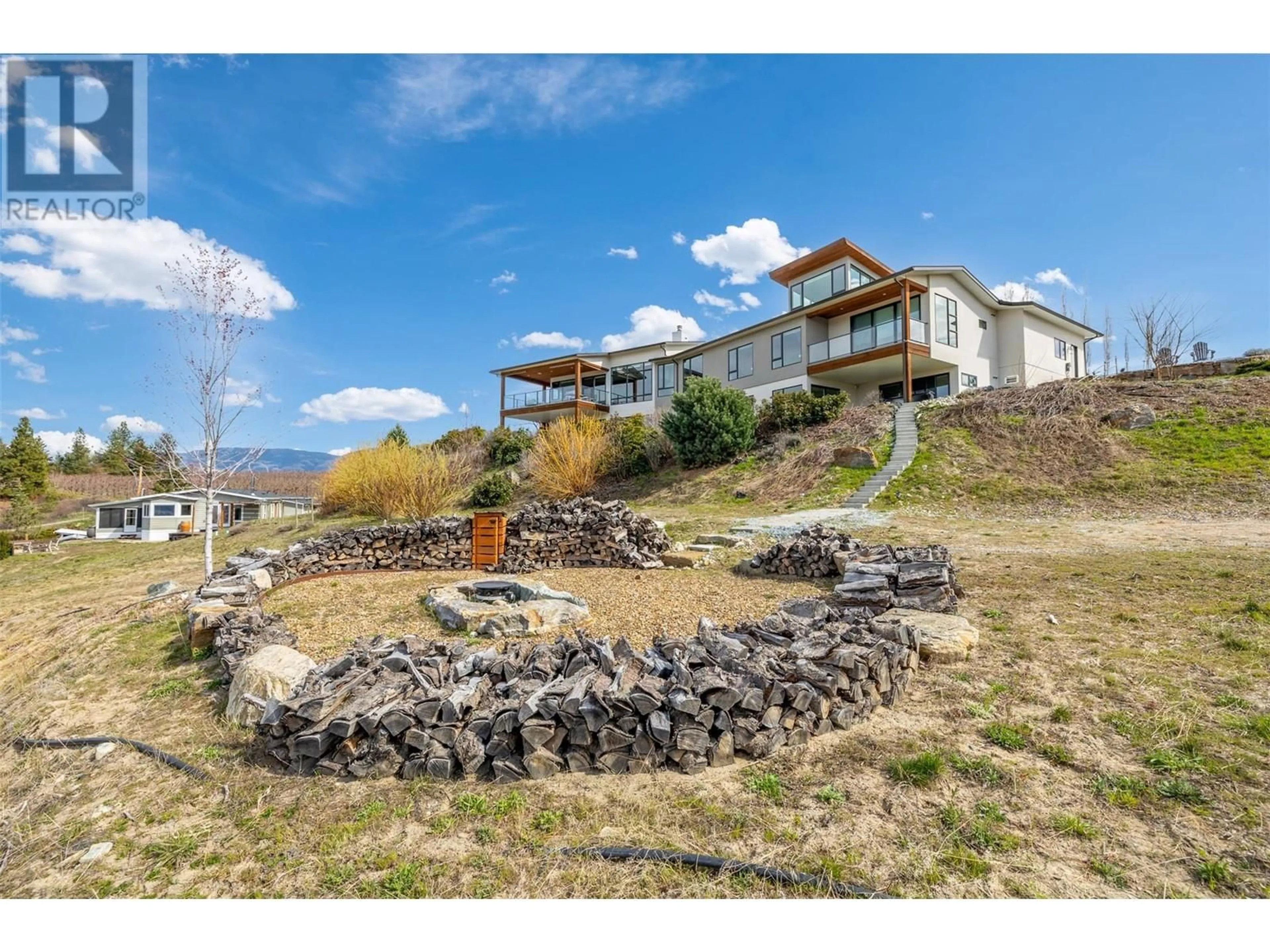 A pic from outside/outdoor area/front of a property/back of a property/a pic from drone, mountain view for 3977/3979 HART ROAD, Kelowna British Columbia V1W4E5