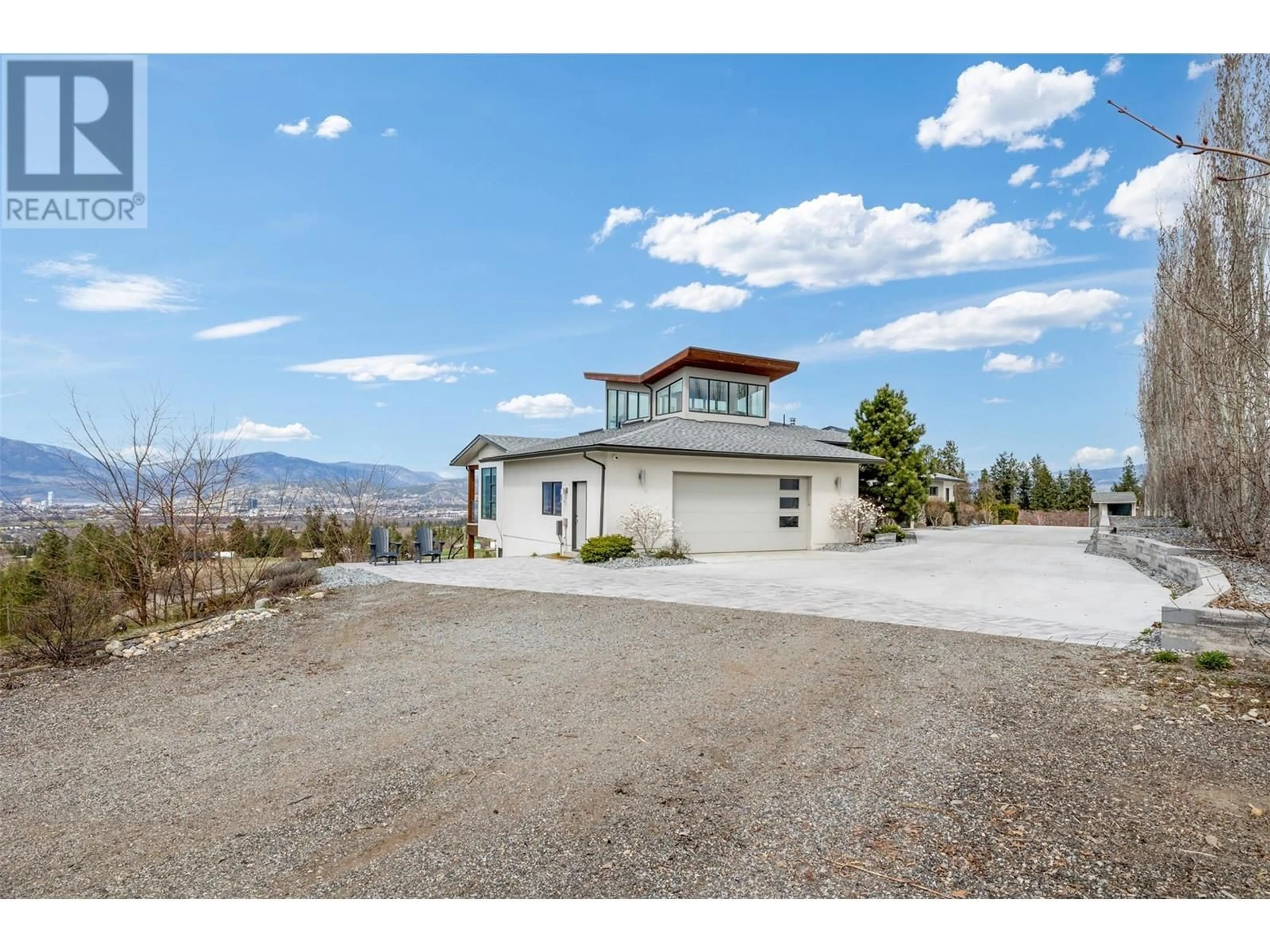 A pic from outside/outdoor area/front of a property/back of a property/a pic from drone, mountain view for 3977/3979 HART ROAD, Kelowna British Columbia V1W4E5