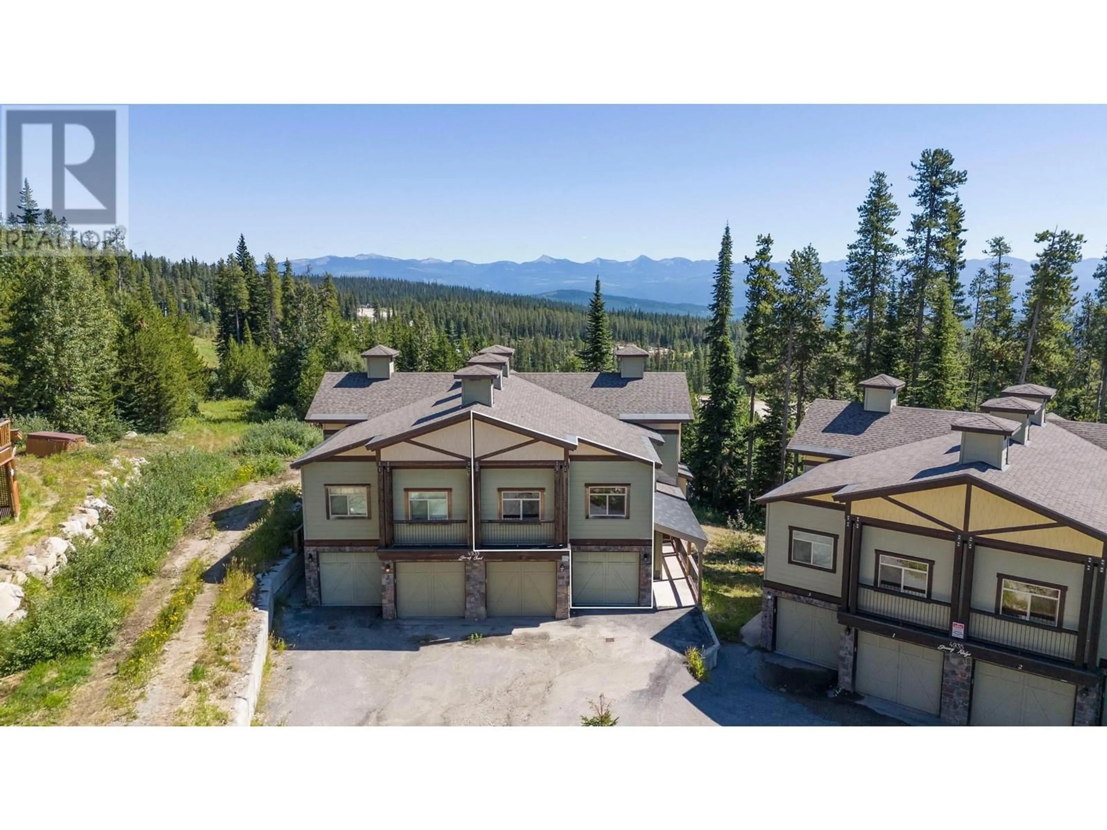 A pic from outside/outdoor area/front of a property/back of a property/a pic from drone, mountain view for 4 - 4939 SNOW PINES ROAD, Big White British Columbia V0E2G0
