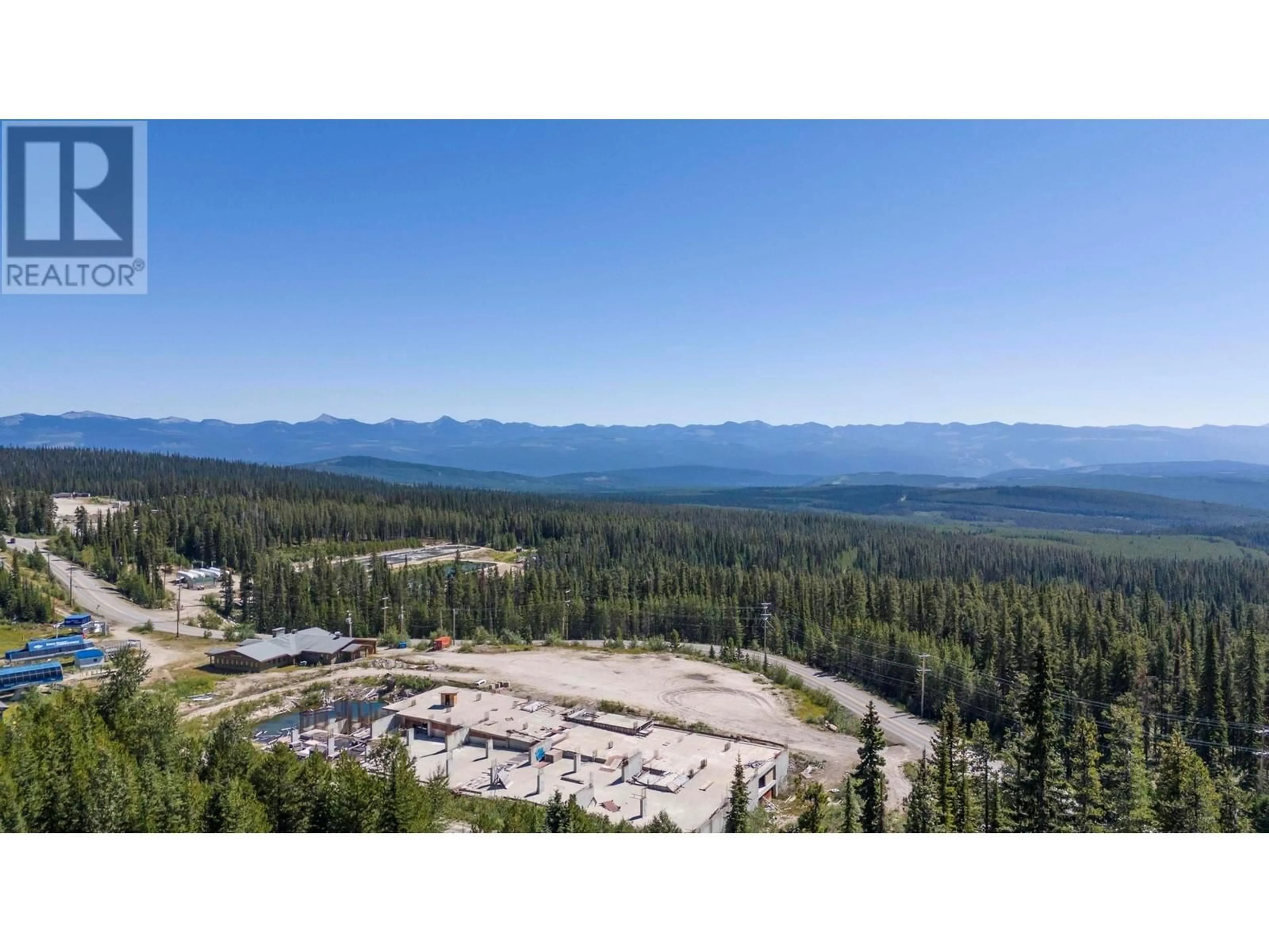 A pic from outside/outdoor area/front of a property/back of a property/a pic from drone, mountain view for 4 - 4939 SNOW PINES ROAD, Big White British Columbia V0E2G0