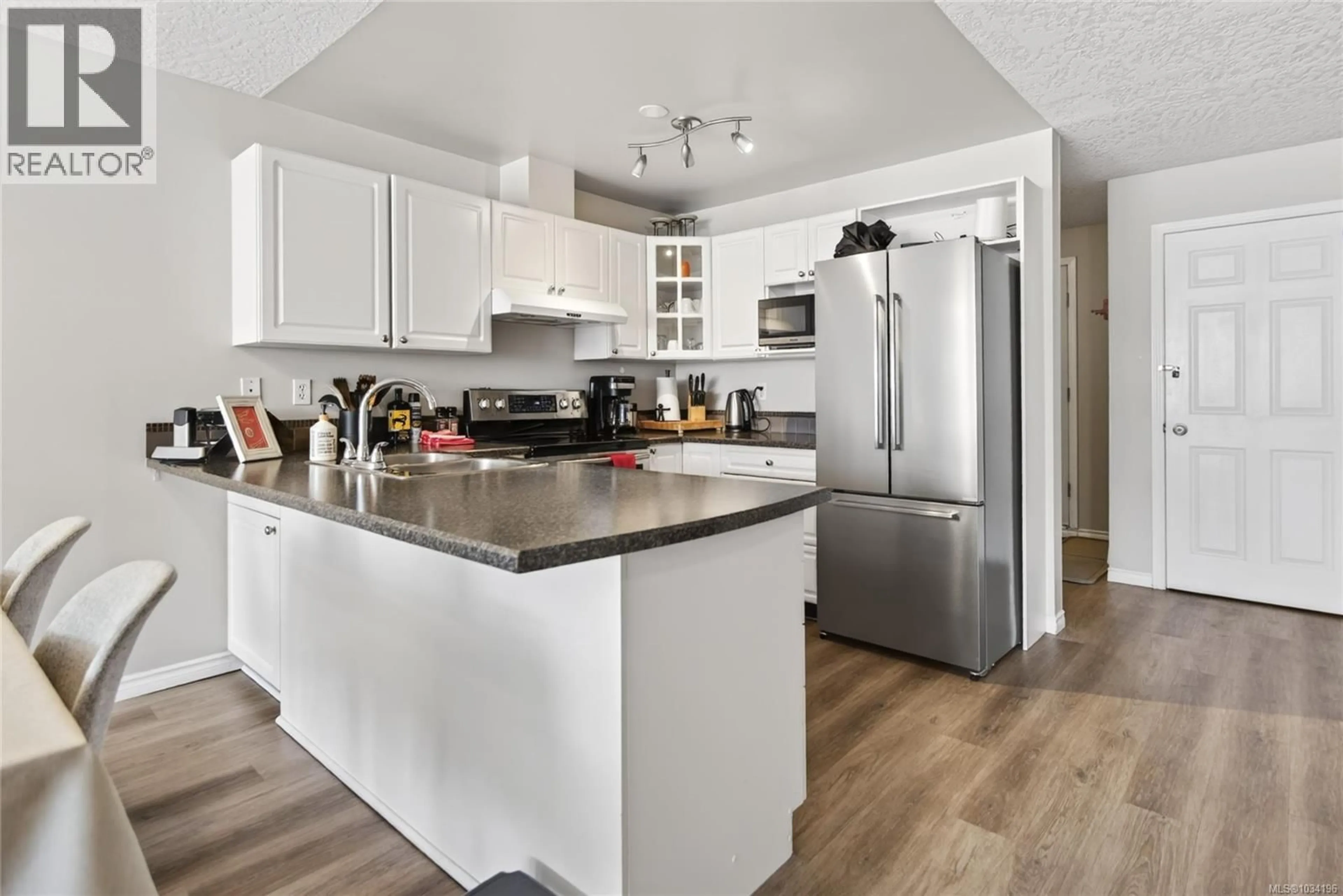 Open concept kitchen, unknown for 211 - 1201 HENRY ROAD, Courtenay British Columbia V9J1L0