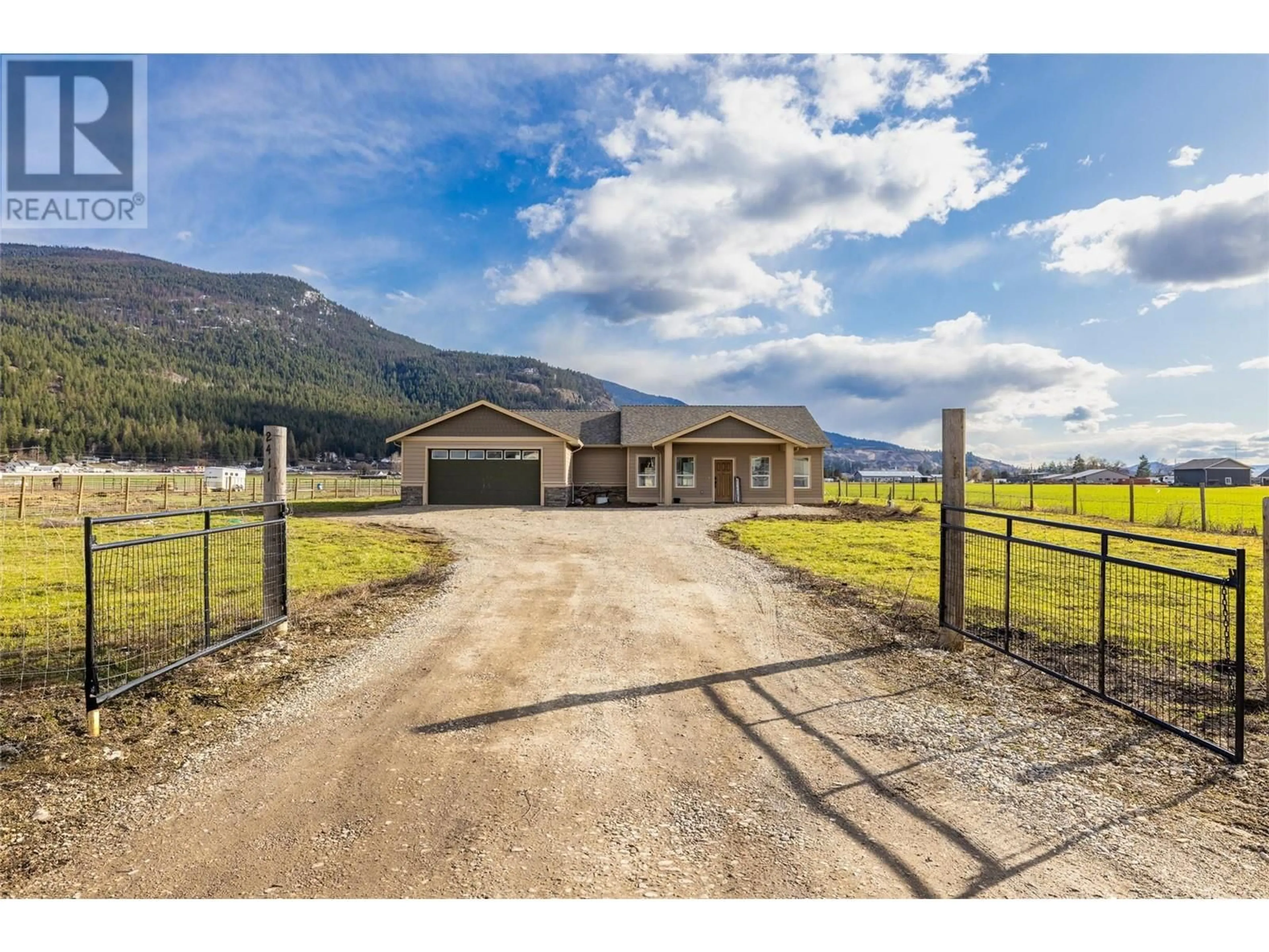A pic from outside/outdoor area/front of a property/back of a property/a pic from drone, mountain view for 2411 HARDING ROAD, Spallumcheen British Columbia V4Y0V9