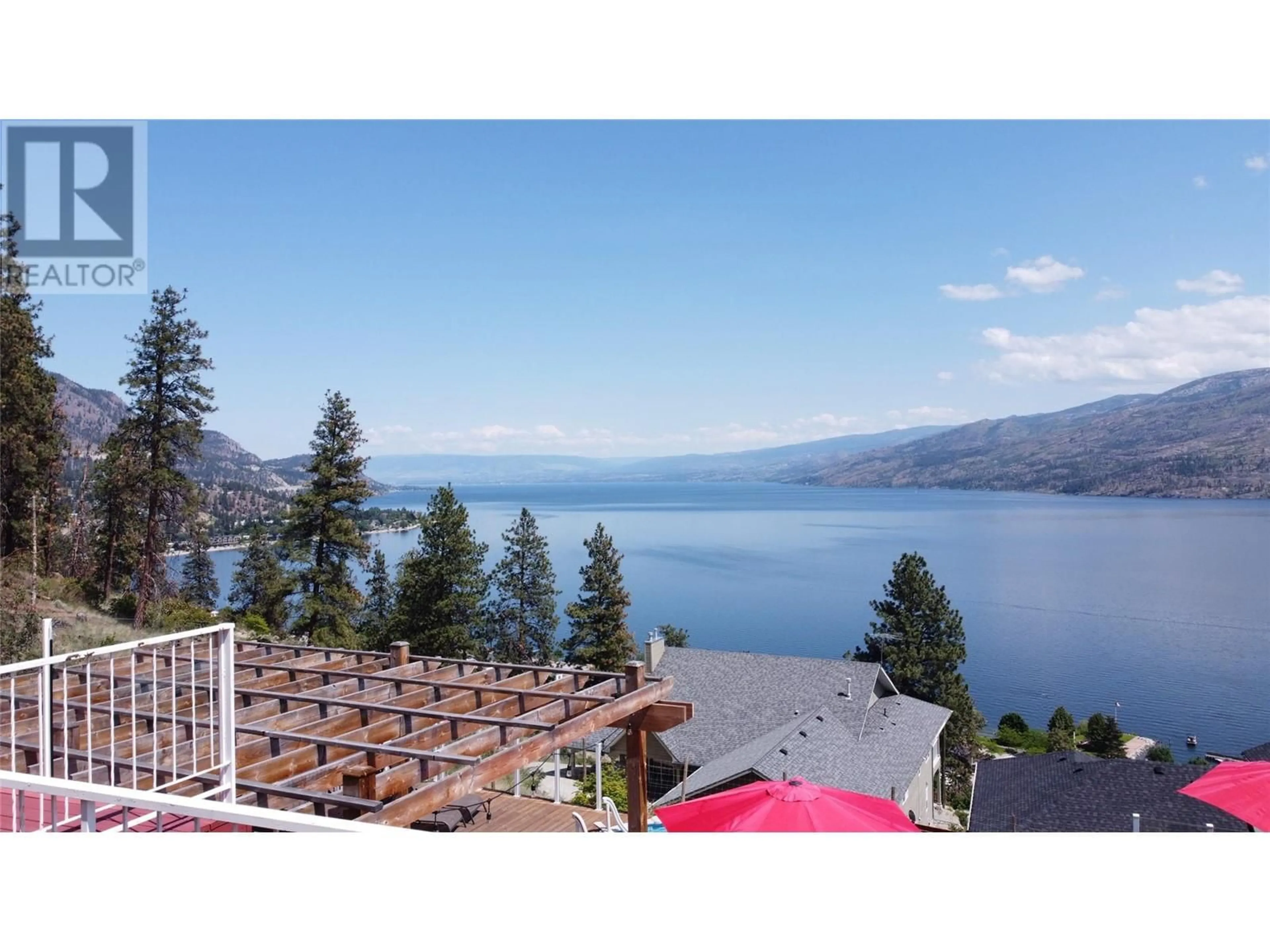 A pic from outside/outdoor area/front of a property/back of a property/a pic from drone, water/lake/river/ocean view for 5803 ATKINSON CRESCENT, Peachland British Columbia V0H1X4