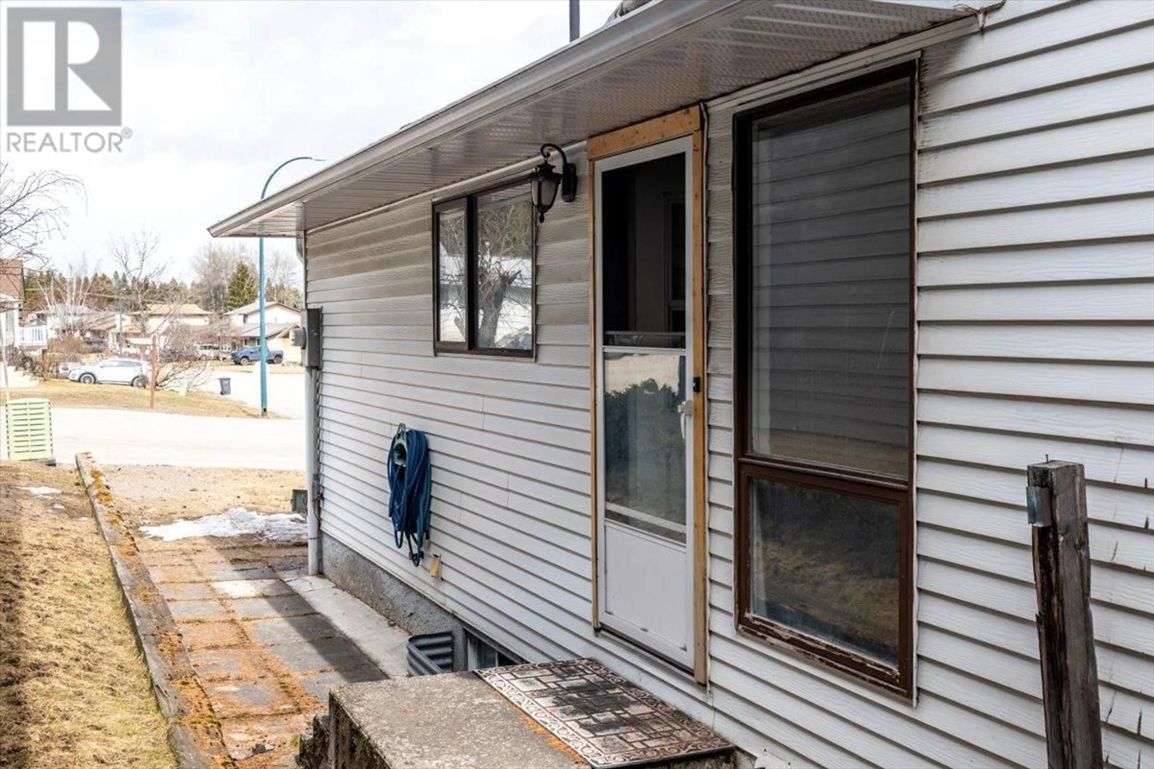 Home with vinyl exterior material, street for 1244 PONDEROSA DRIVE, Sparwood British Columbia V0B2G2