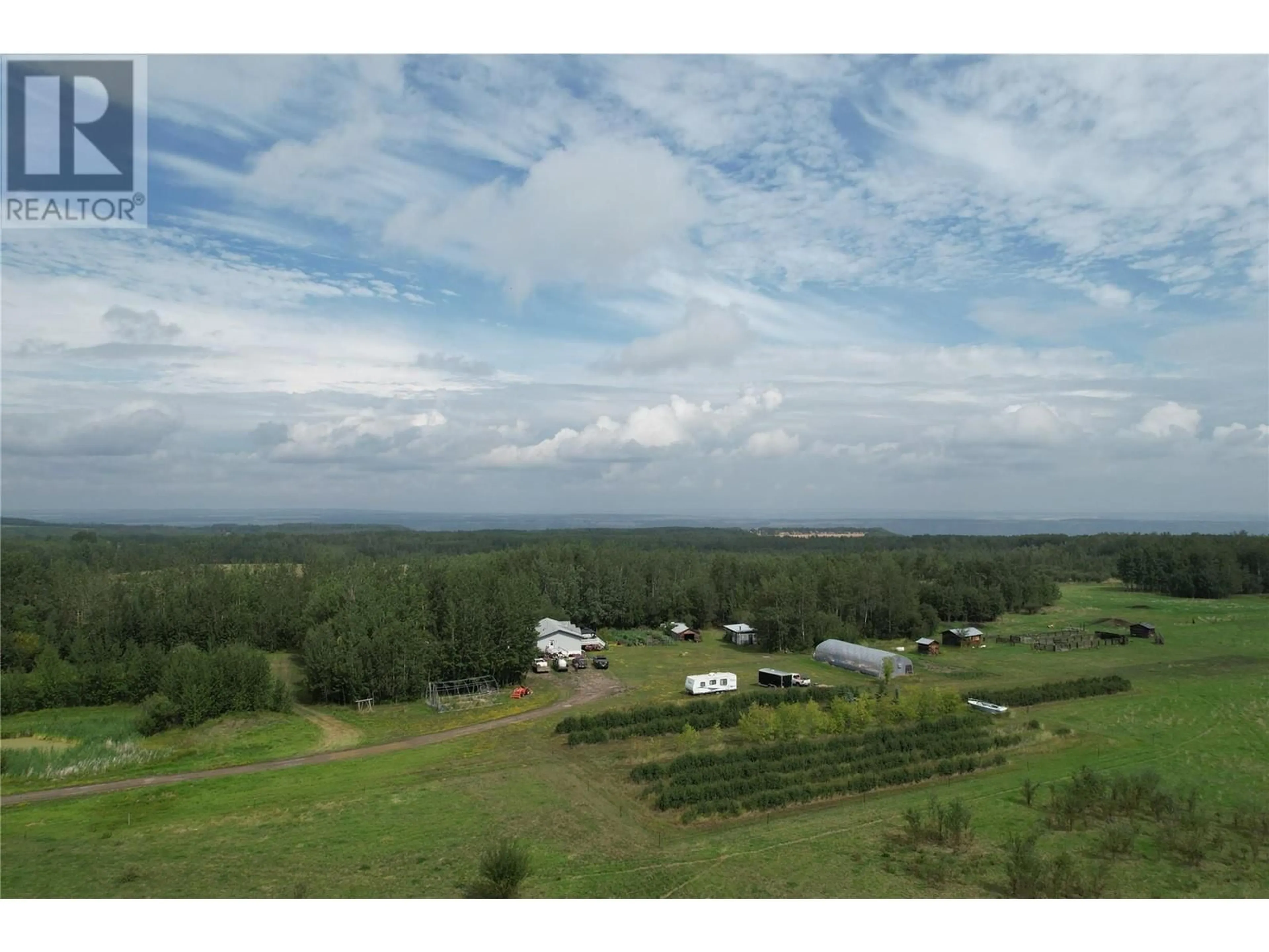 A pic from outside/outdoor area/front of a property/back of a property/a pic from drone, unknown for 2770 241 ROAD, Dawson Creek British Columbia V0C2K0