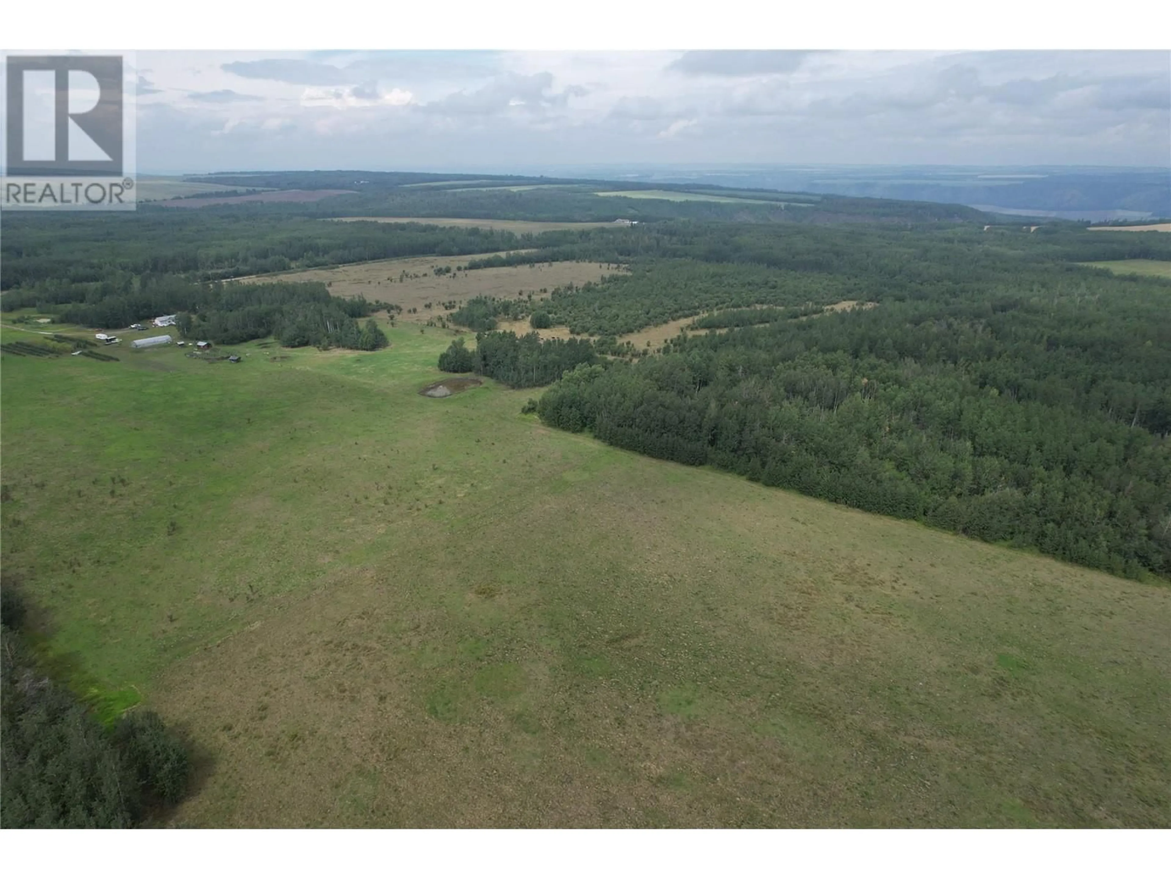 A pic from outside/outdoor area/front of a property/back of a property/a pic from drone, forest/trees view for 2770 241 ROAD, Dawson Creek British Columbia V0C2K0