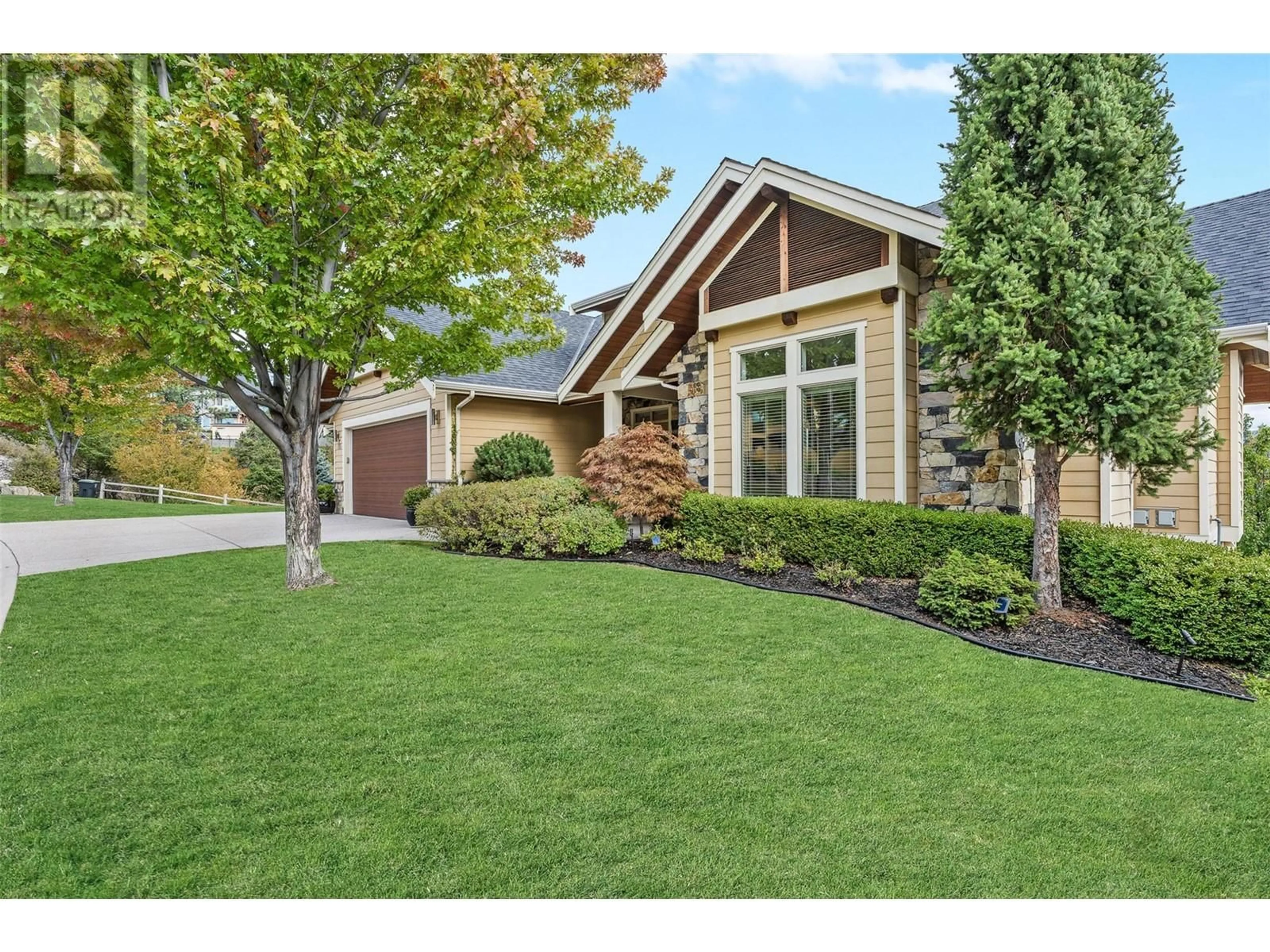 Home with vinyl exterior material, street for 129 LEDGE ROCK COURT, Kelowna British Columbia V1V3A2