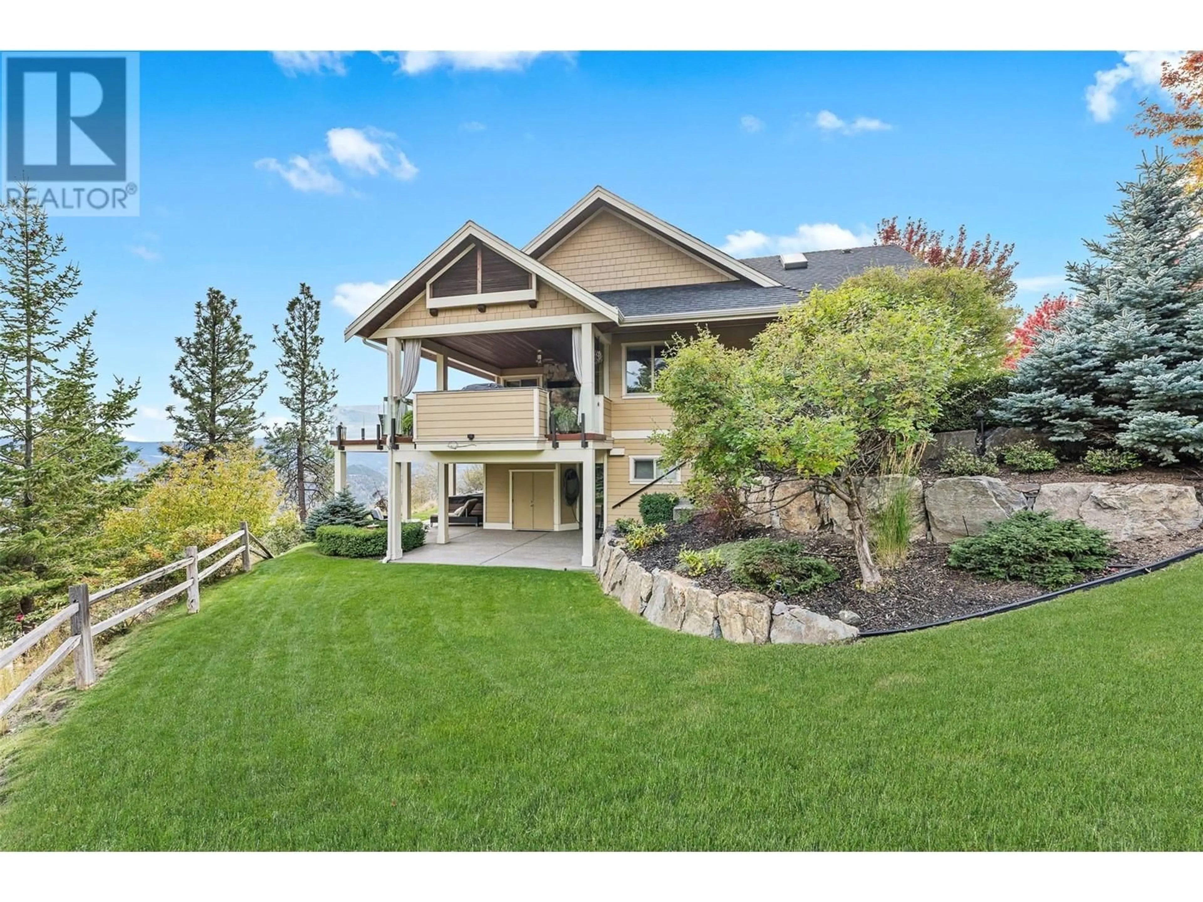 A pic from outside/outdoor area/front of a property/back of a property/a pic from drone, mountain view for 129 LEDGE ROCK COURT, Kelowna British Columbia V1V3A2