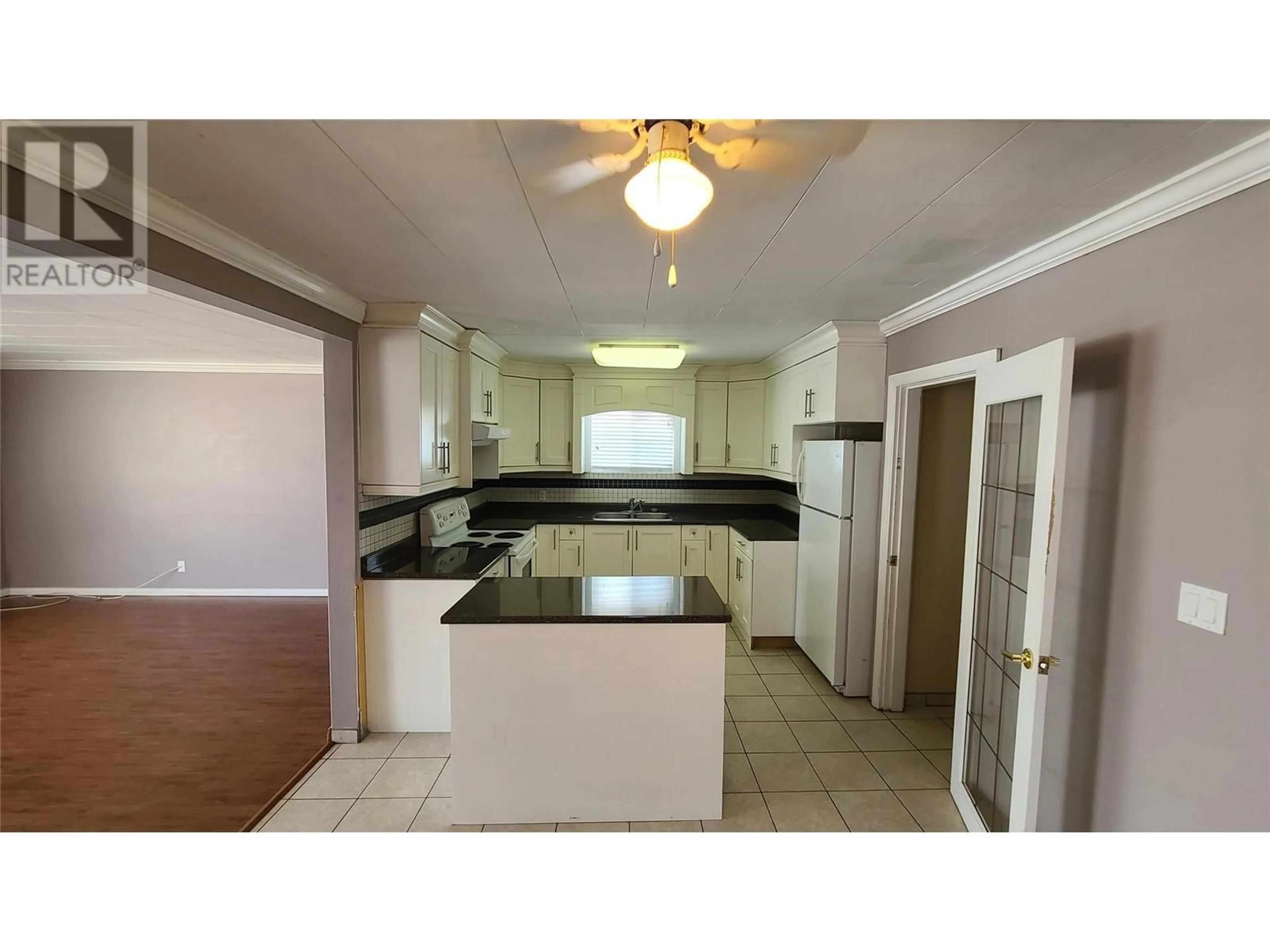 Open concept kitchen, ceramic/tile floor for 6056 SPARTAN STREET, Oliver British Columbia V0H1T0