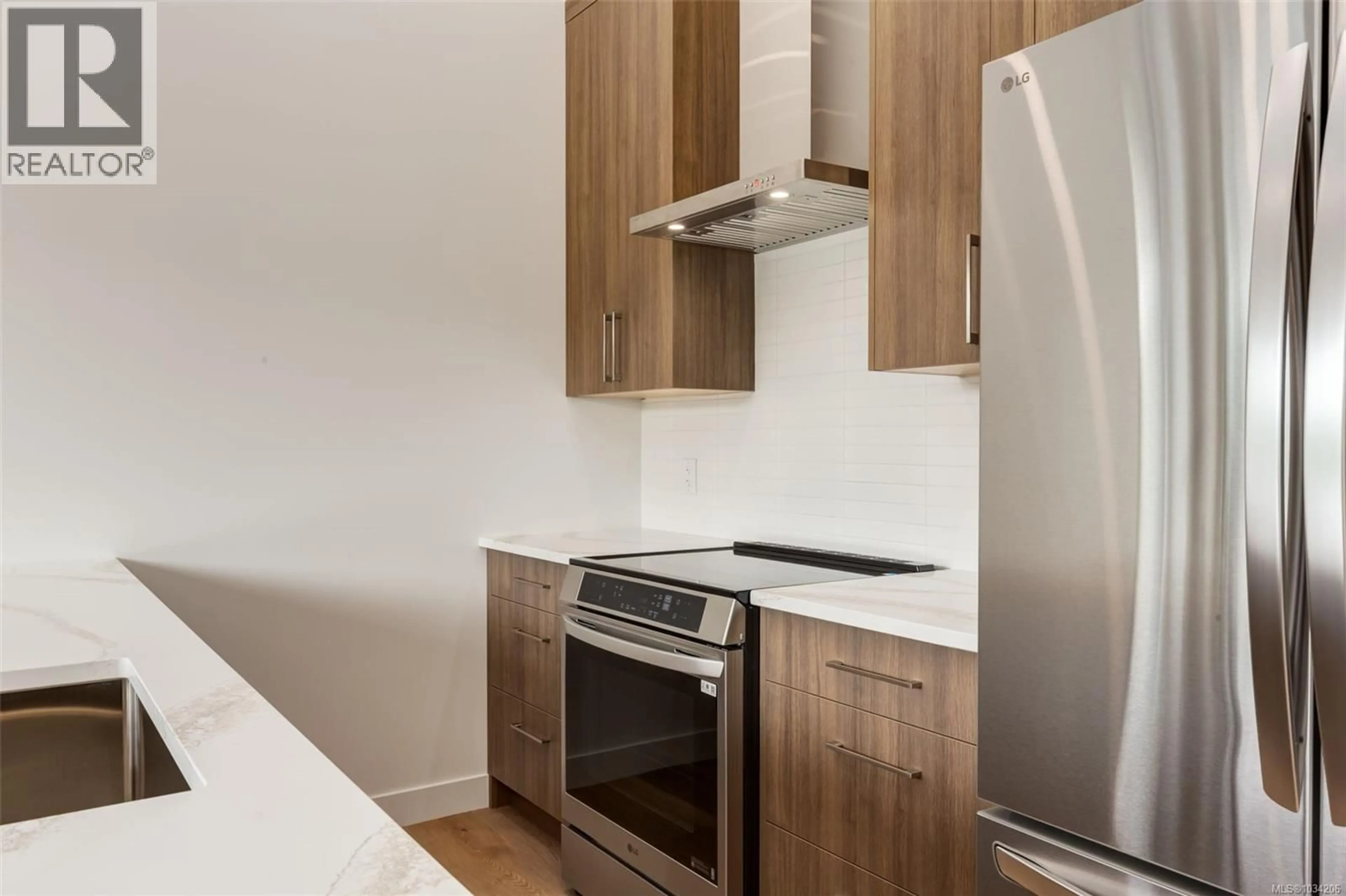 Standard kitchen, wood/laminate floor for 206 - 7181 LANTZVILLE ROAD, Lantzville British Columbia V0R2H0