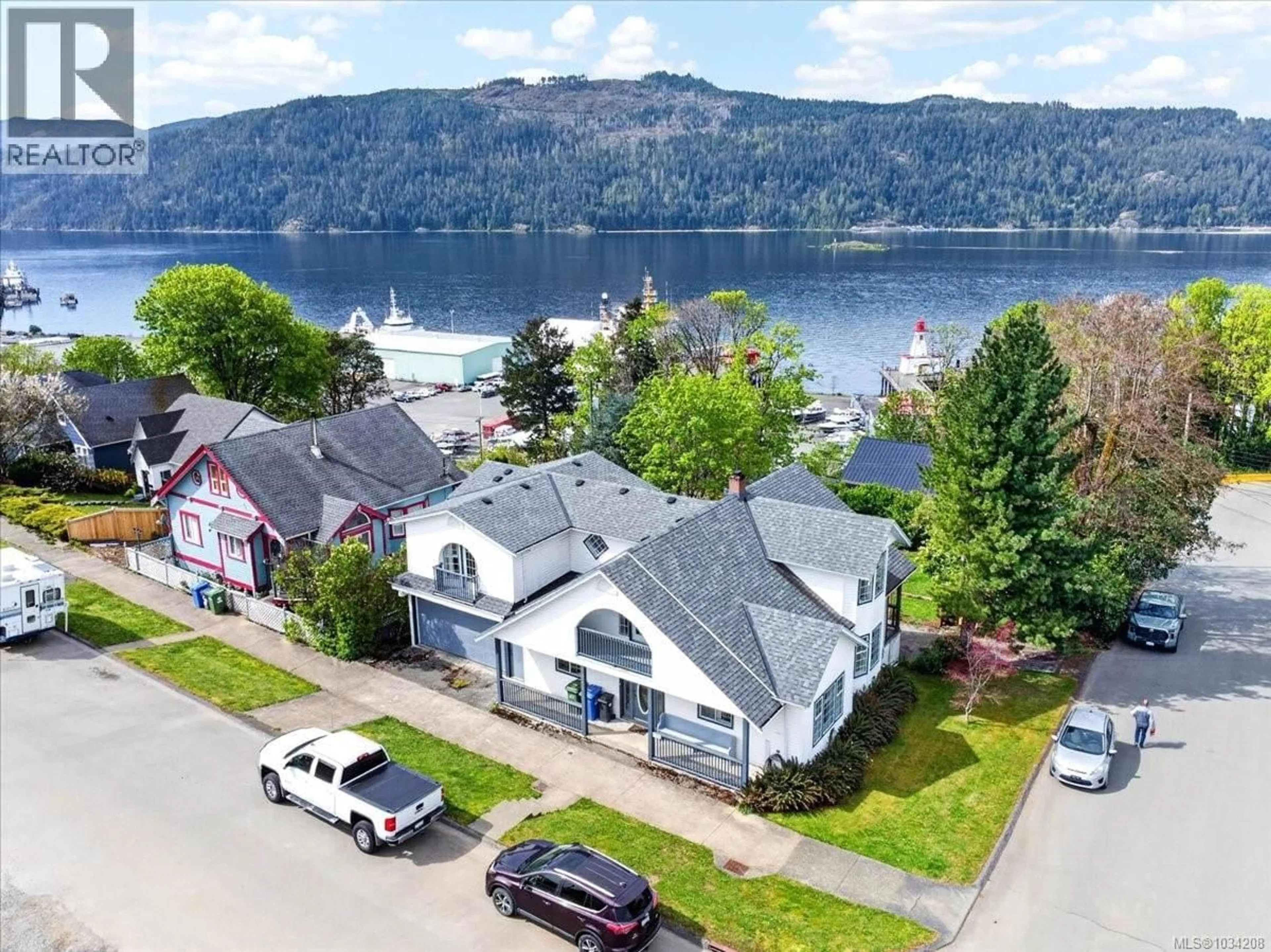 A pic from outside/outdoor area/front of a property/back of a property/a pic from drone, water/lake/river/ocean view for 2880 1ST AVENUE, Port Alberni British Columbia V9Y1X4
