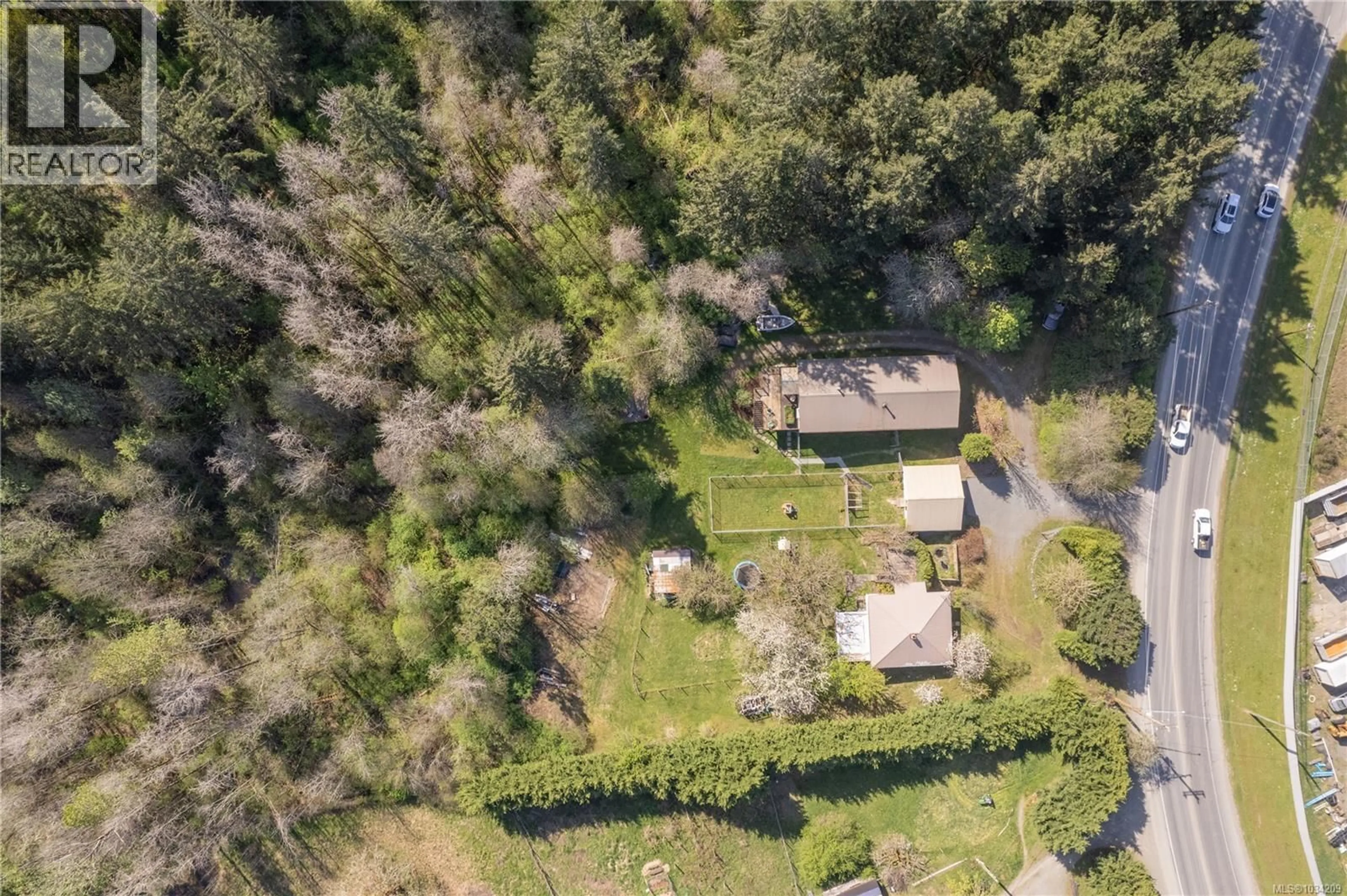 A pic from outside/outdoor area/front of a property/back of a property/a pic from drone, unknown for 3468 COWICHAN LAKE ROAD, Duncan British Columbia V9L6K5