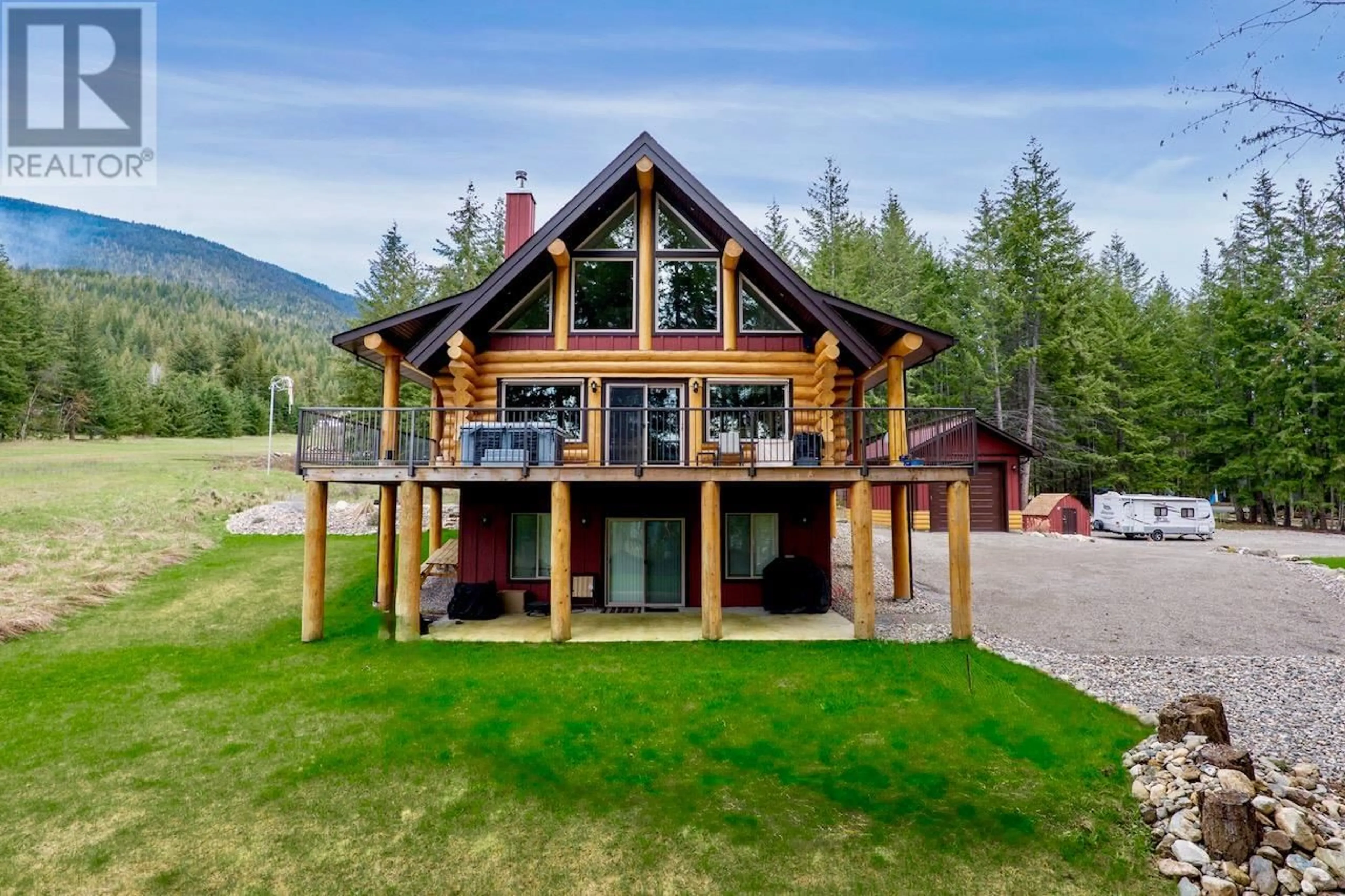 A pic from outside/outdoor area/front of a property/back of a property/a pic from drone, mountain view for 2589 AIRSTRIP ROAD, Anglemont British Columbia V0E1M8