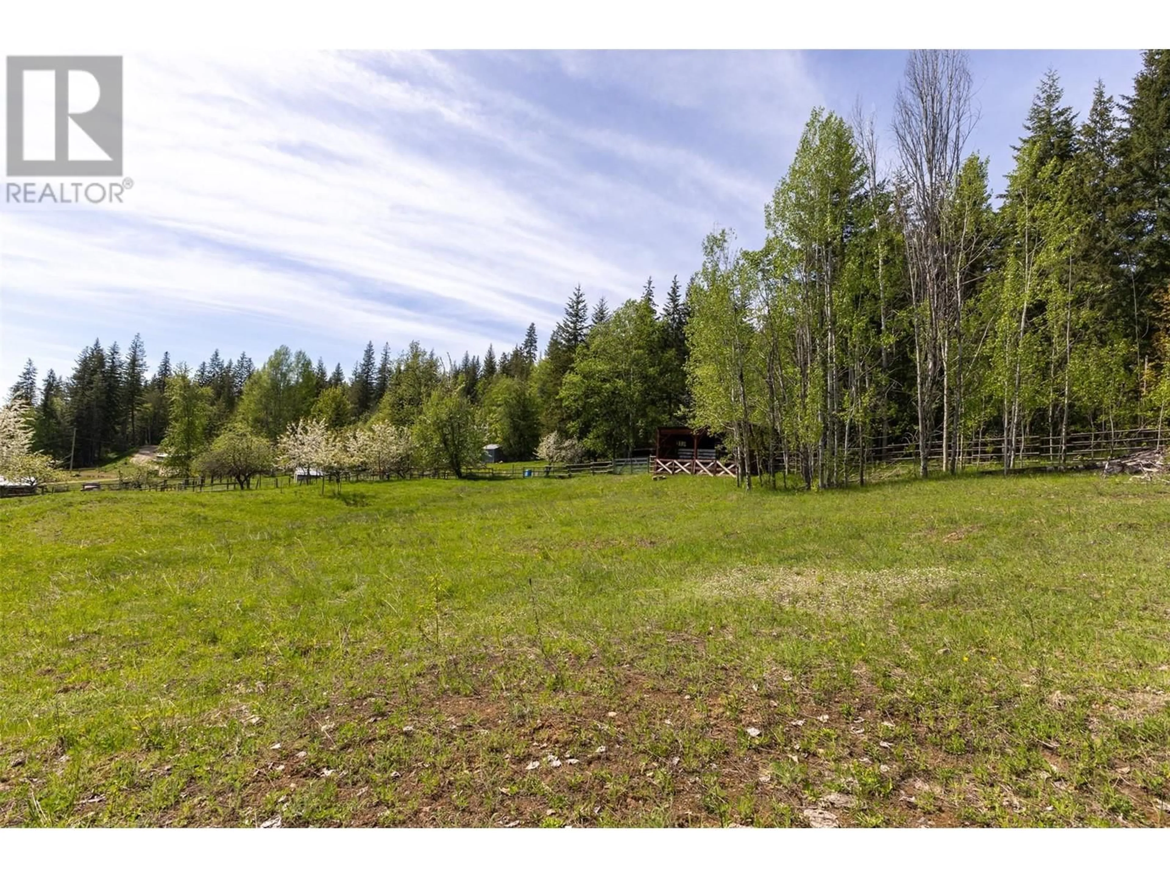 A pic from outside/outdoor area/front of a property/back of a property/a pic from drone, forest/trees view for 24 BLACK ROAD, Salmon Arm British Columbia V1E2Y1