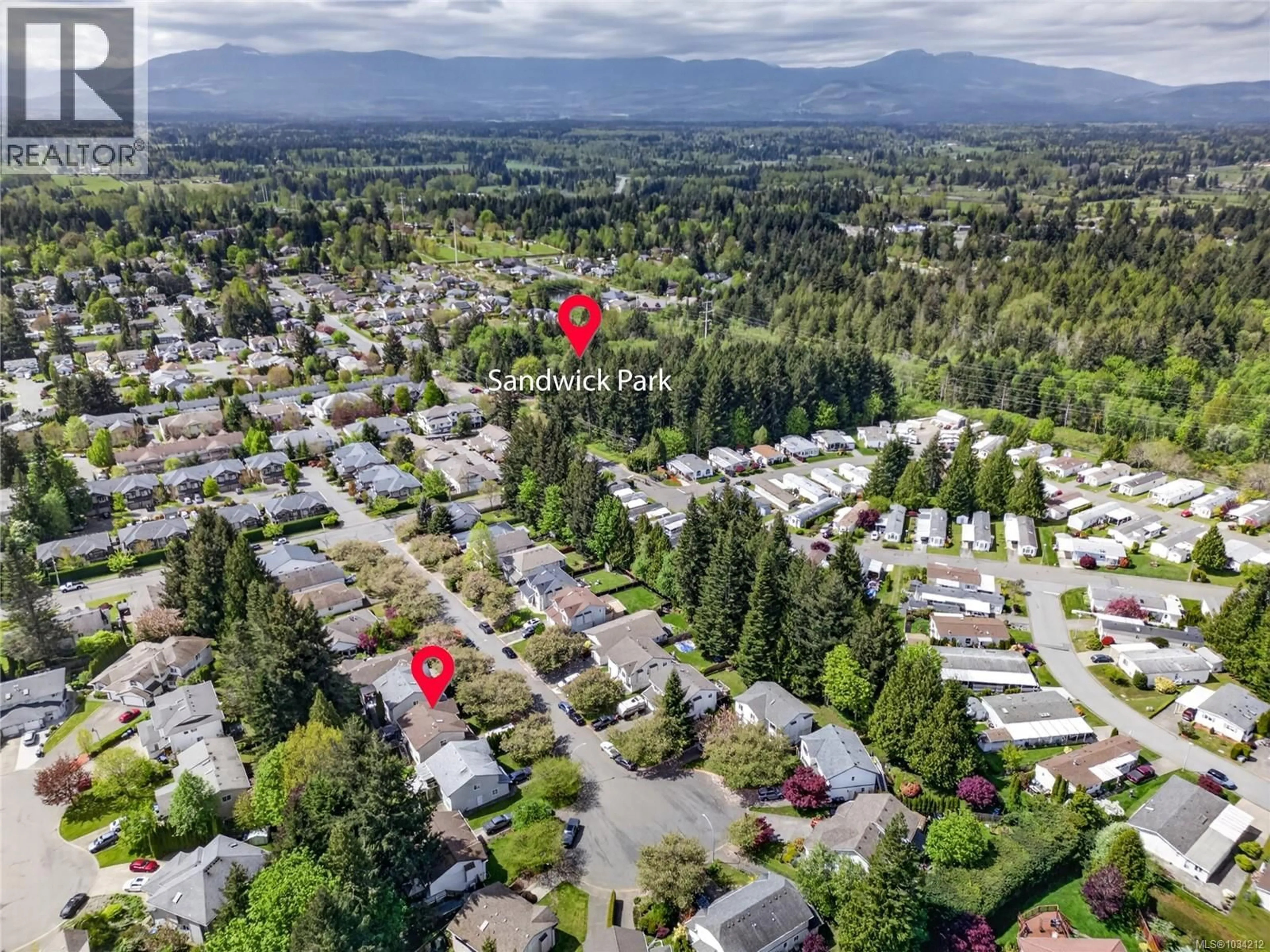 A pic from outside/outdoor area/front of a property/back of a property/a pic from drone, mountain view for 2111 ANNA PLACE, Courtenay British Columbia V9N9B4