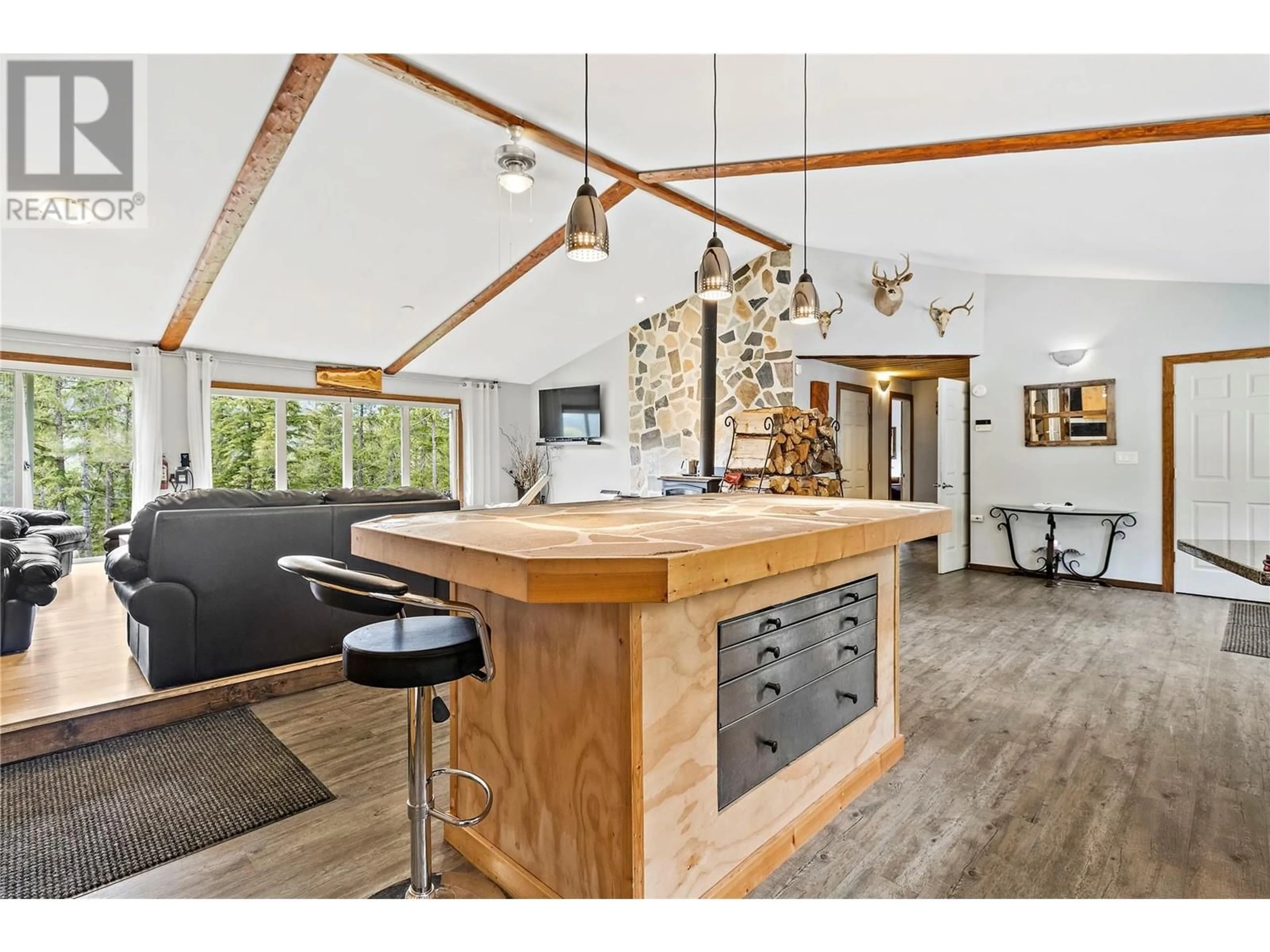 Open concept kitchen, wood/laminate floor for 1446 NITTEL ROAD, Seymour Arm British Columbia V0E1M0