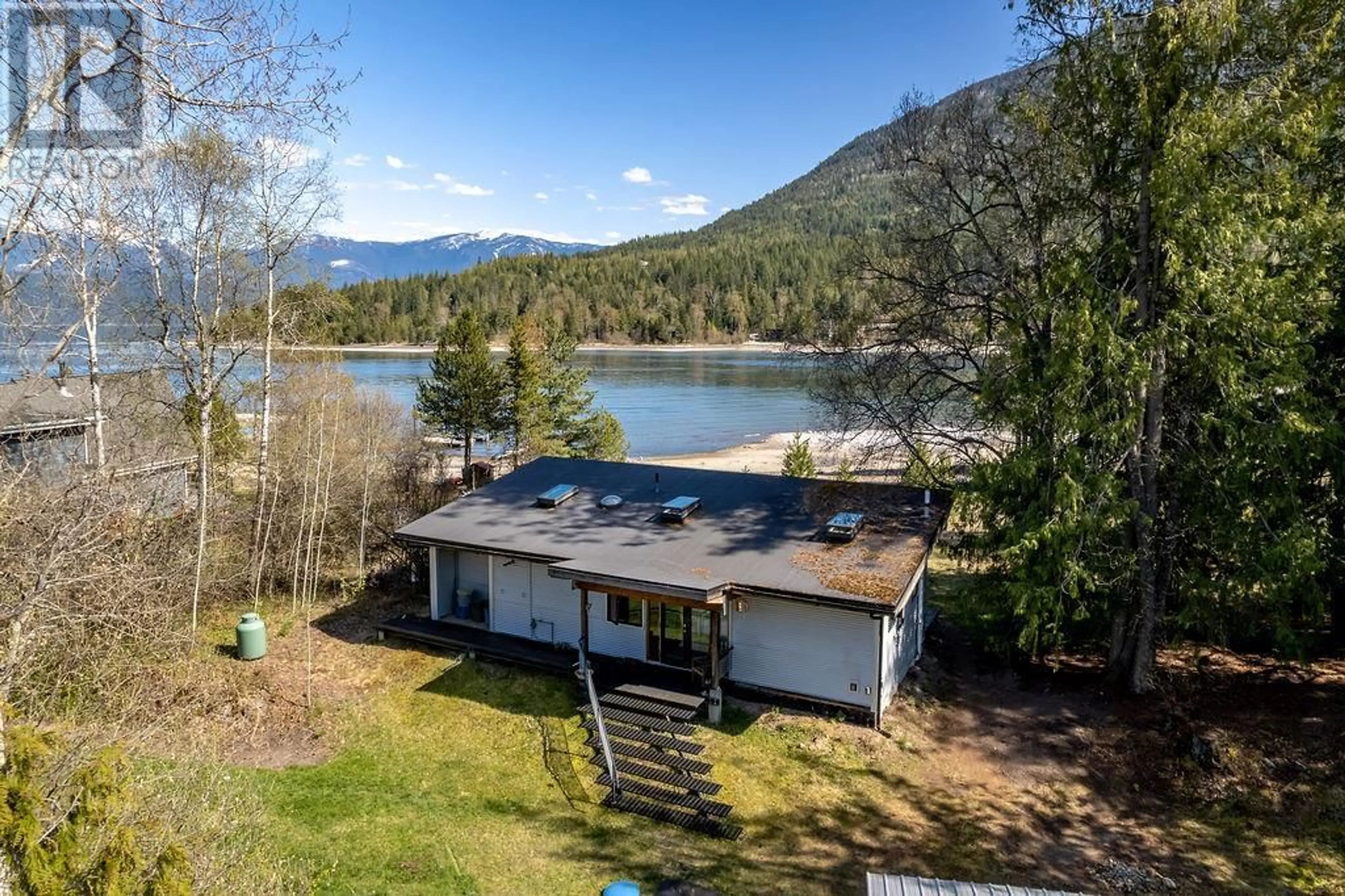 A pic from outside/outdoor area/front of a property/back of a property/a pic from drone, water/lake/river/ocean view for 8902 BEACH STREET, Balfour British Columbia V0G1C0