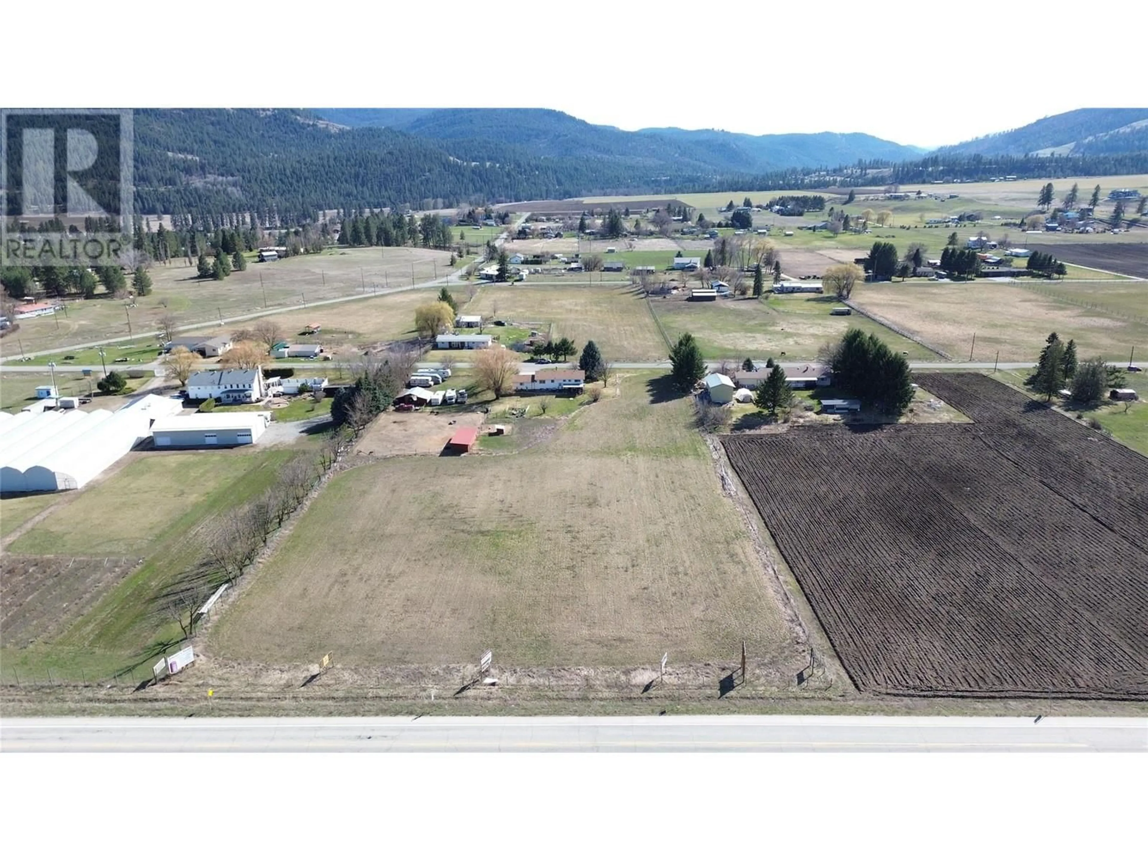 A pic from outside/outdoor area/front of a property/back of a property/a pic from drone, mountain view for 4575 CENTRE ROAD, Grand Forks British Columbia V0H1H5