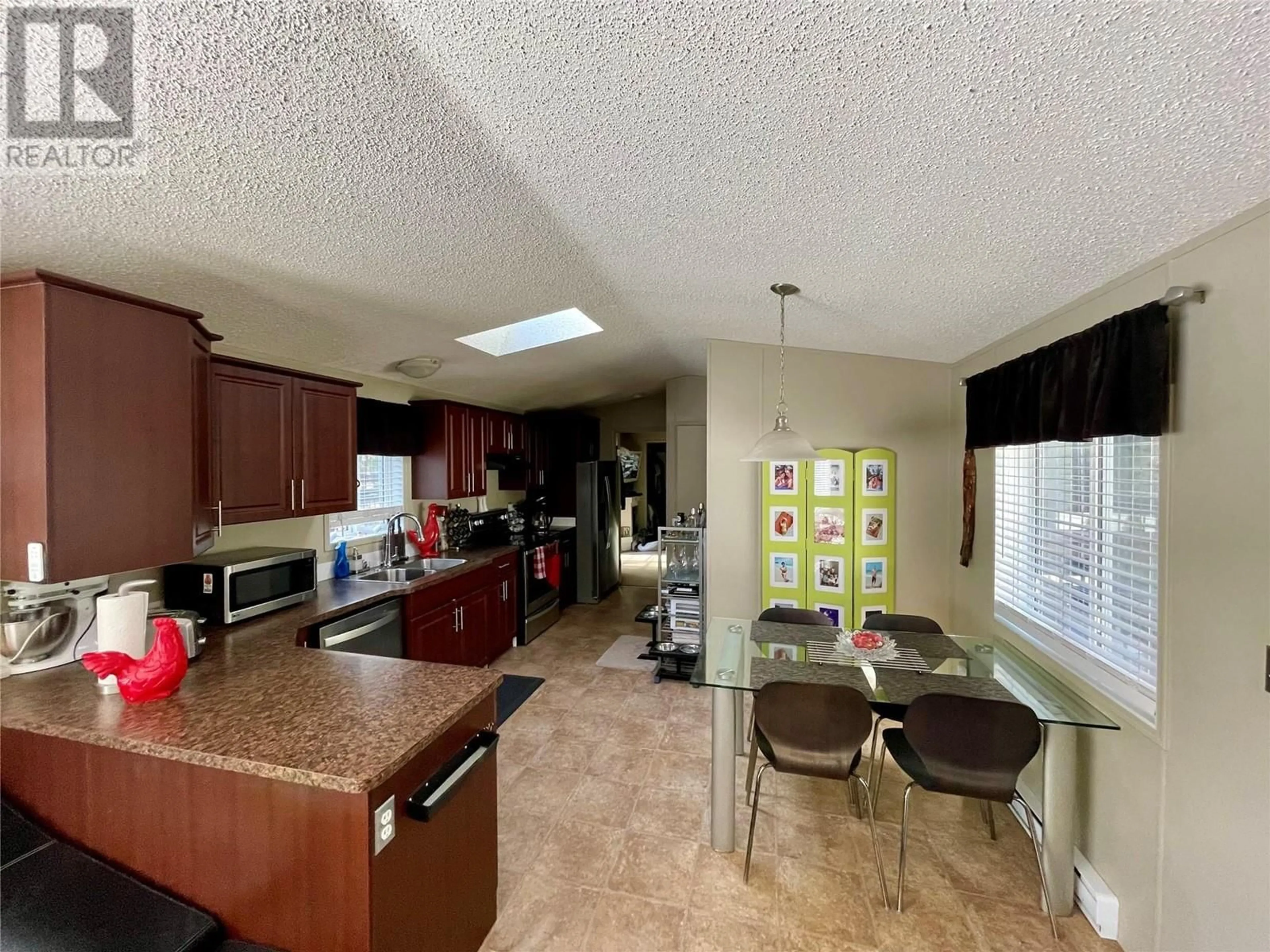 Open concept kitchen, ceramic/tile floor for 70 SMOKER ROAD, Beaverdell British Columbia V0H1A0